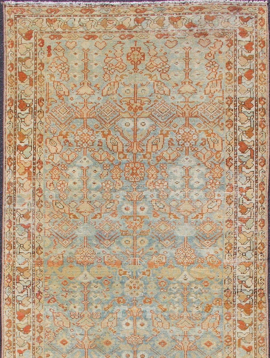 Antique Persian Malayer runner with geometric all-over design in light blue
Blue, coral and peach Malayer antique rug from Persia with geometric motifs, rug SUS-1909-431, Country of origin / type: Iran / Malayer, circa 1920.

This antique Malayer