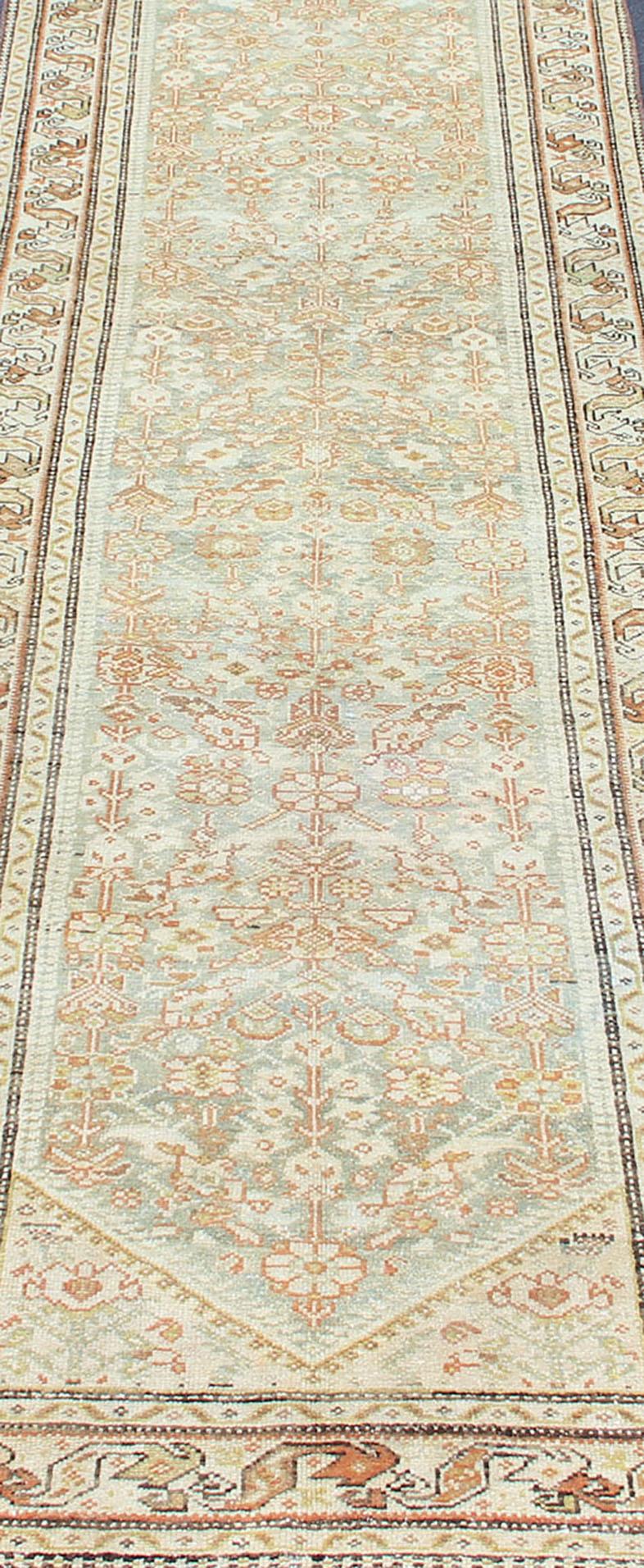 Antique Persian Malayer runner with geometric all-over design in light blue. Blue, coral and peach Malayer antique rug from Persia with geometric motifs, Keivan Woven Arts / rug SUS-2009-617 Country of origin / type: Iran / Malayer, circa