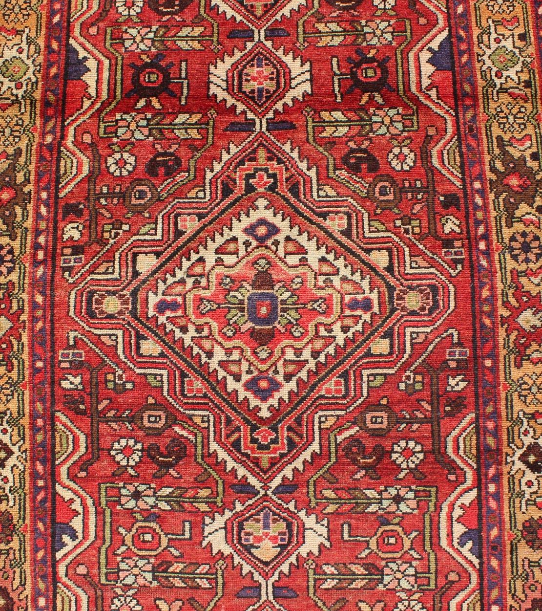 Mid-20th Century Antique Persian Malayer Runner with Medallion Design in Beautiful Red and Khaki For Sale