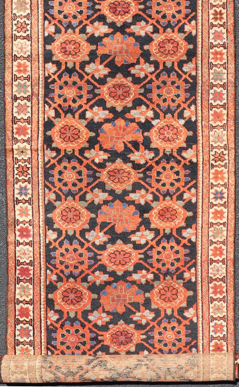 Antique Persian Malayer Runner with Reds and Oranges on a Charcoal Background In Good Condition For Sale In Atlanta, GA