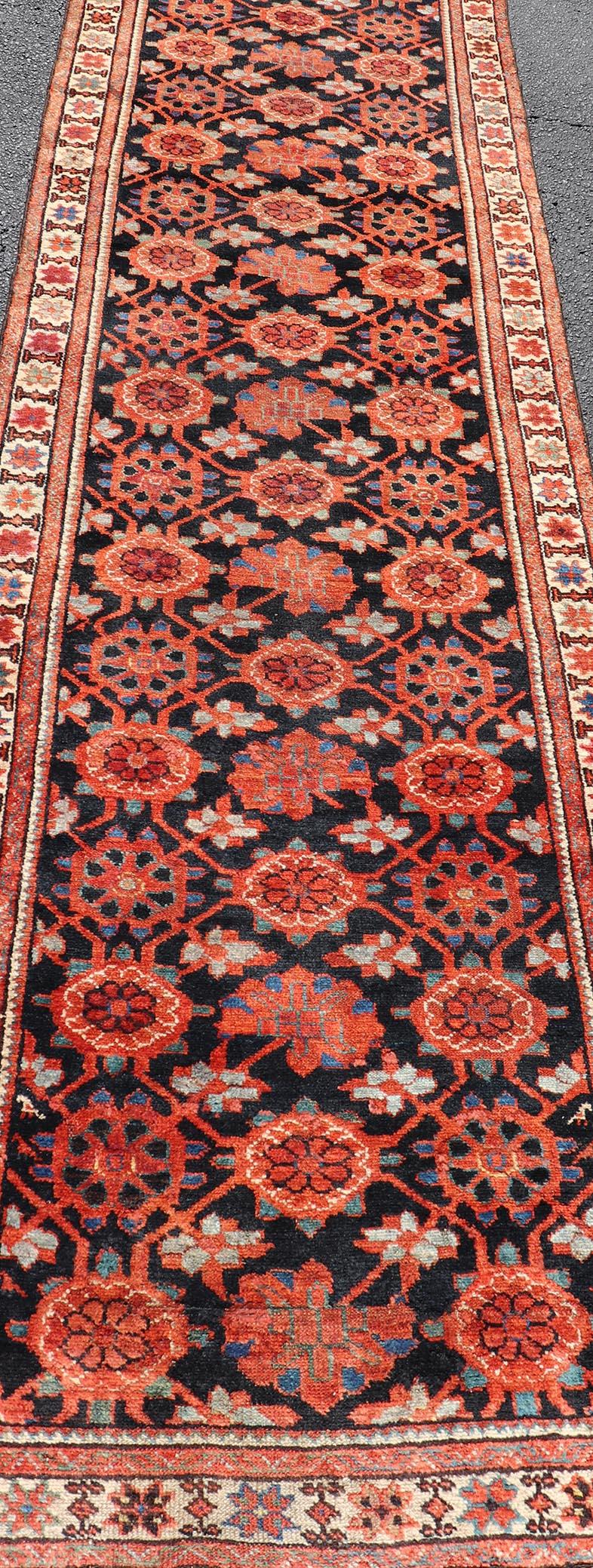 Antique Persian Malayer Runner with Reds and Oranges on a Charcoal Background For Sale 1