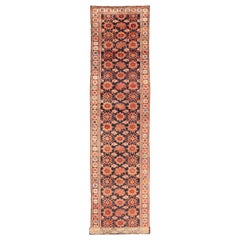 Antique Persian Malayer Runner with Reds and Oranges on a Charcoal Background