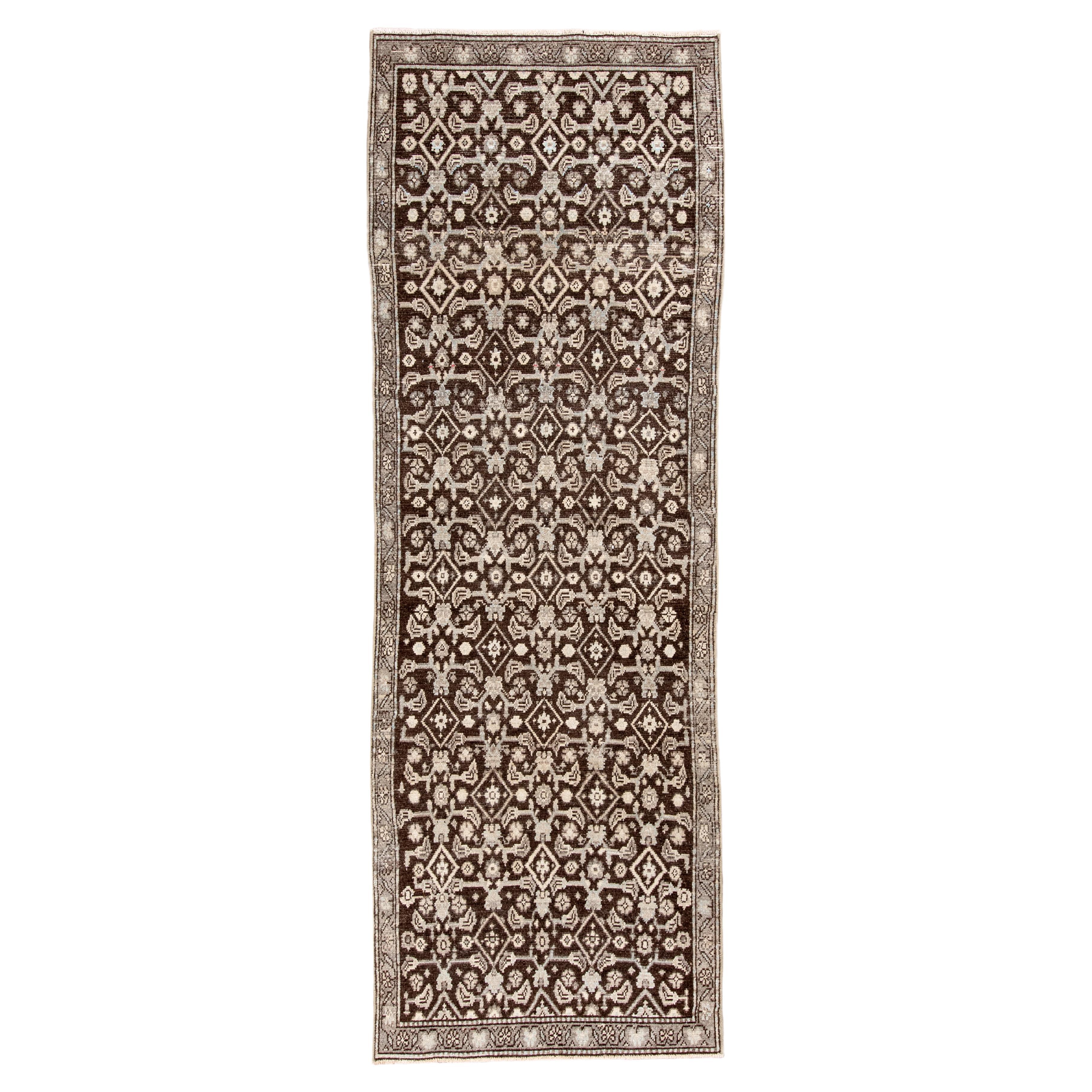 Antique Persian Malayer Runner with Repeating Floral Medallions en vente