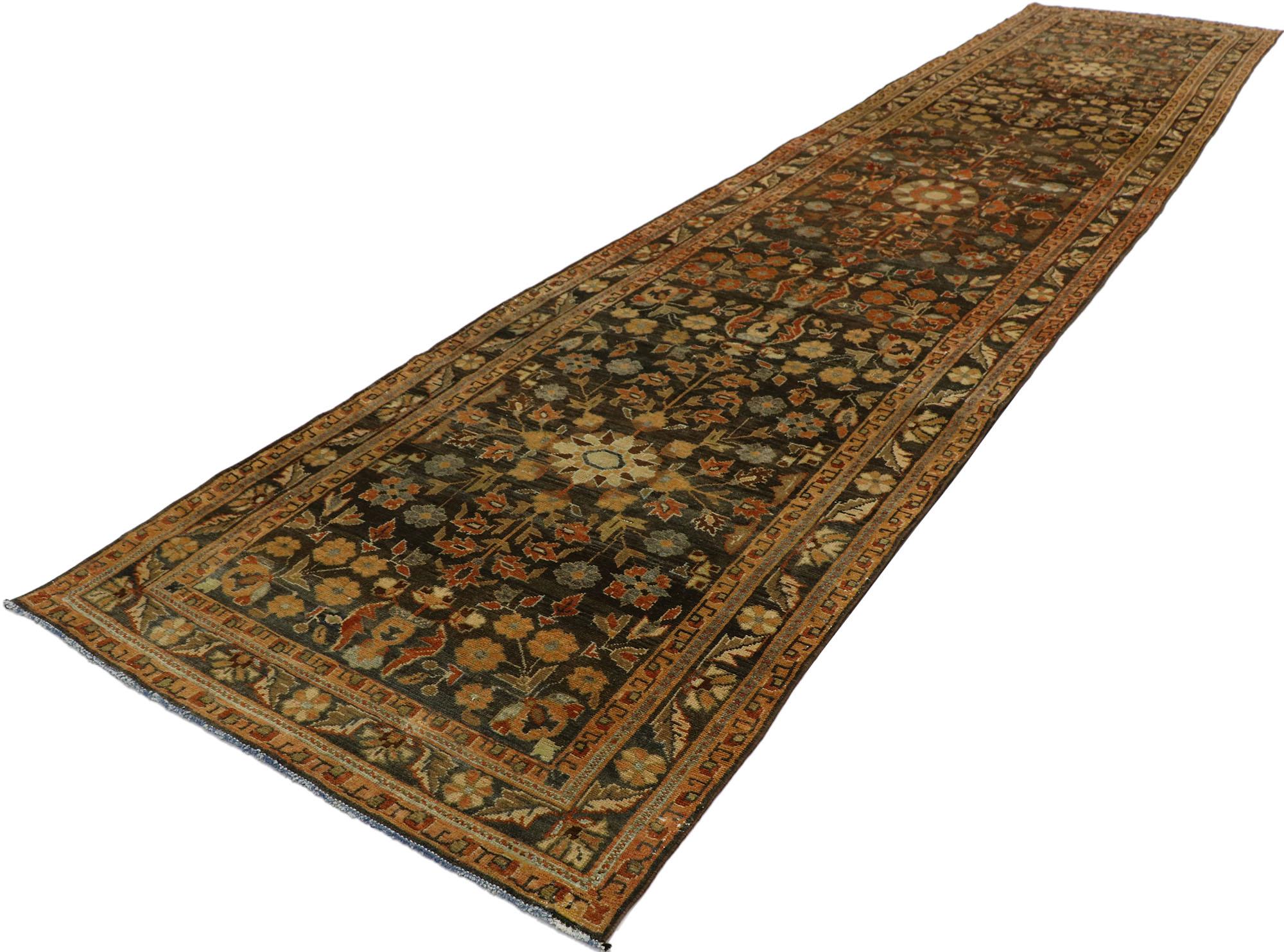 53237 antique Persian Malayer Runner with Rustic Jacobean style. This hand knotted wool antique Persian Malayer runner features an all-over Guli Hinnai pattern overlaid upon an abrashed brown and gray field. Comprised of henna flowers arranged in a