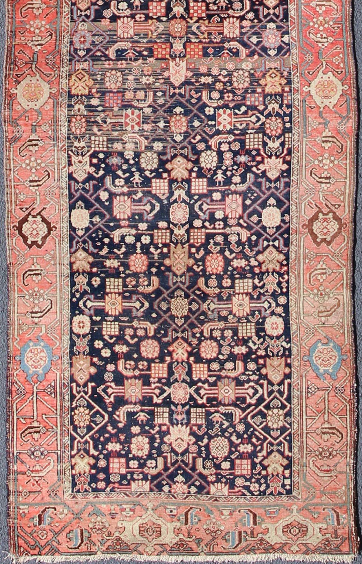 Variegated Border Malayer antique runner from Persia with geometric floral central field design, rug zir-14, country of origin / type: Iran / Malayer, circa 1900.

This antique Persian Malayer runner, circa early 20th century, relies heavily on