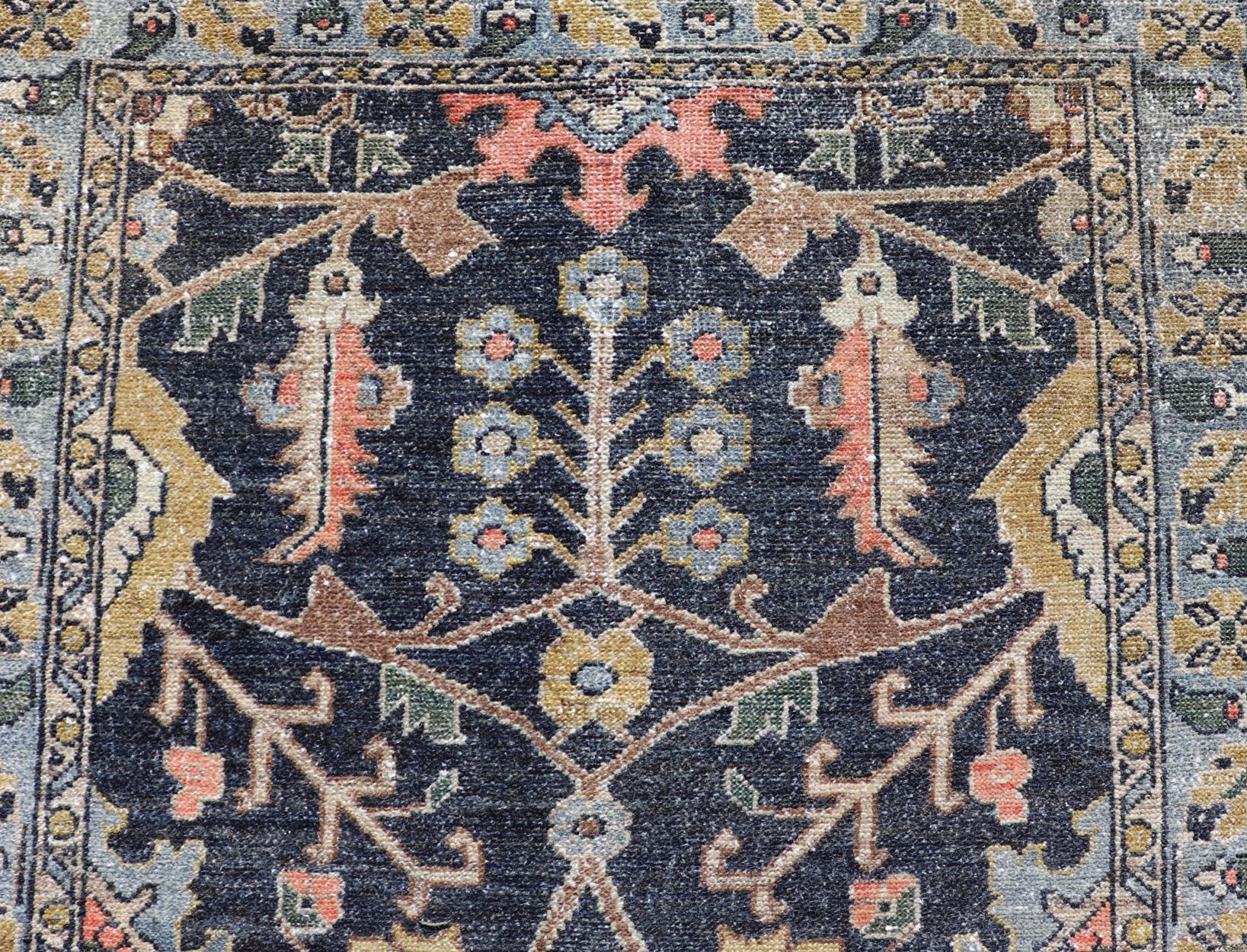 Antique Persian Malayer Tribal Runner in Steal Gray Blue, Green, Gold, and Coral. Keivan Woven Arts: rug W22-0106, Country of Origin: Iran; Type: Malayer; Design: All-Over, Floral Paisley; .
Measures: 3'4 x 16'0 
This antique Persian Malayer