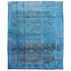 Malayer persan ancien avec motif sur toute sa surface dans les tons bleus