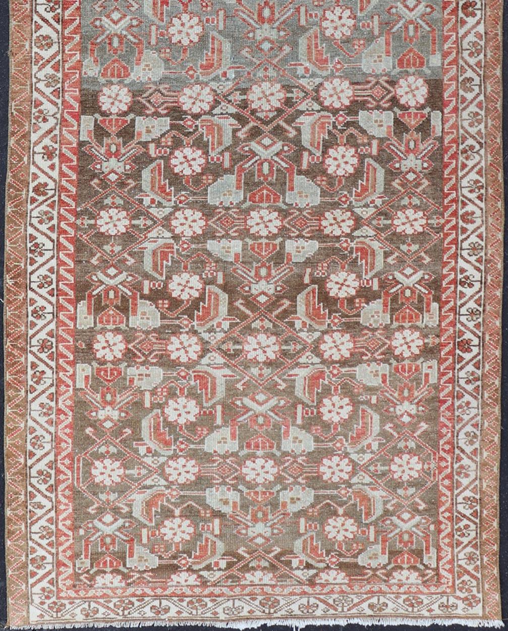 Tribal Antique Persian Malayer with Sub-Geometric Floral Design in Reds & Earthy Tones For Sale