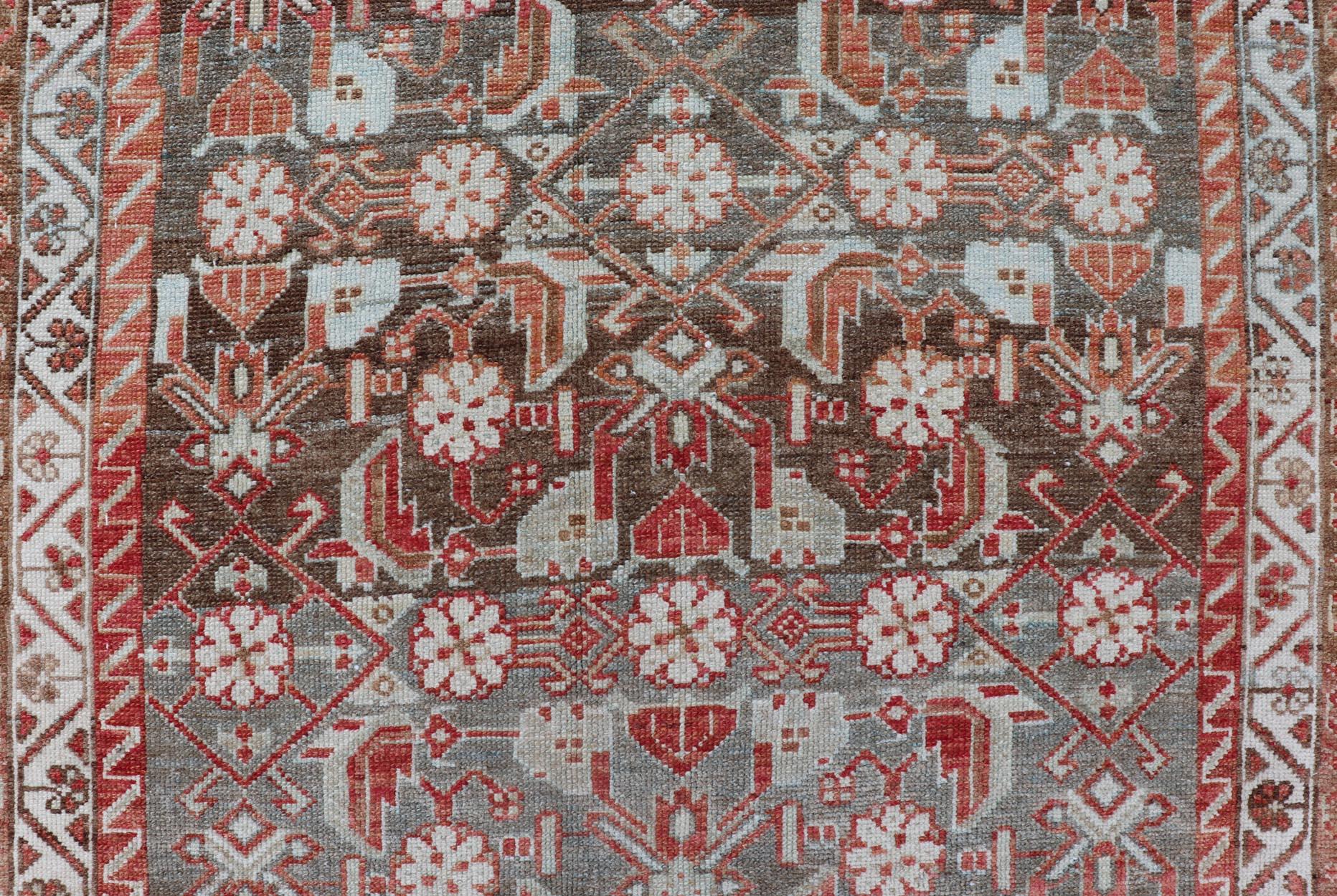 Wool Antique Persian Malayer with Sub-Geometric Floral Design in Reds & Earthy Tones For Sale