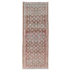Antiker persischer Malayer mit subgeometrischem floralem Design in Rot- und Erdtönen