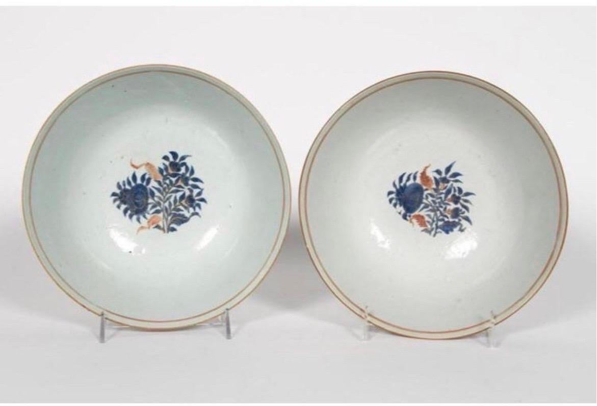 A pair of 18th century Chinese export porcelain serving bowls or wash bowls. Each with floral and cobalt decoration to rim and interior. Decoration showcases Persian market affiliation.