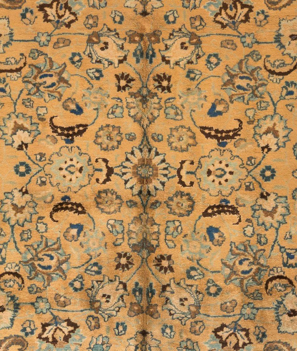 A Mashad rug uses cotton to form a base followed by a wool pile for a soft, cozy and durable texture. The Mashad rug typically has medallions and pendants woven throughout with ivory, red and blue as its commonly used colors.

This lovely antique