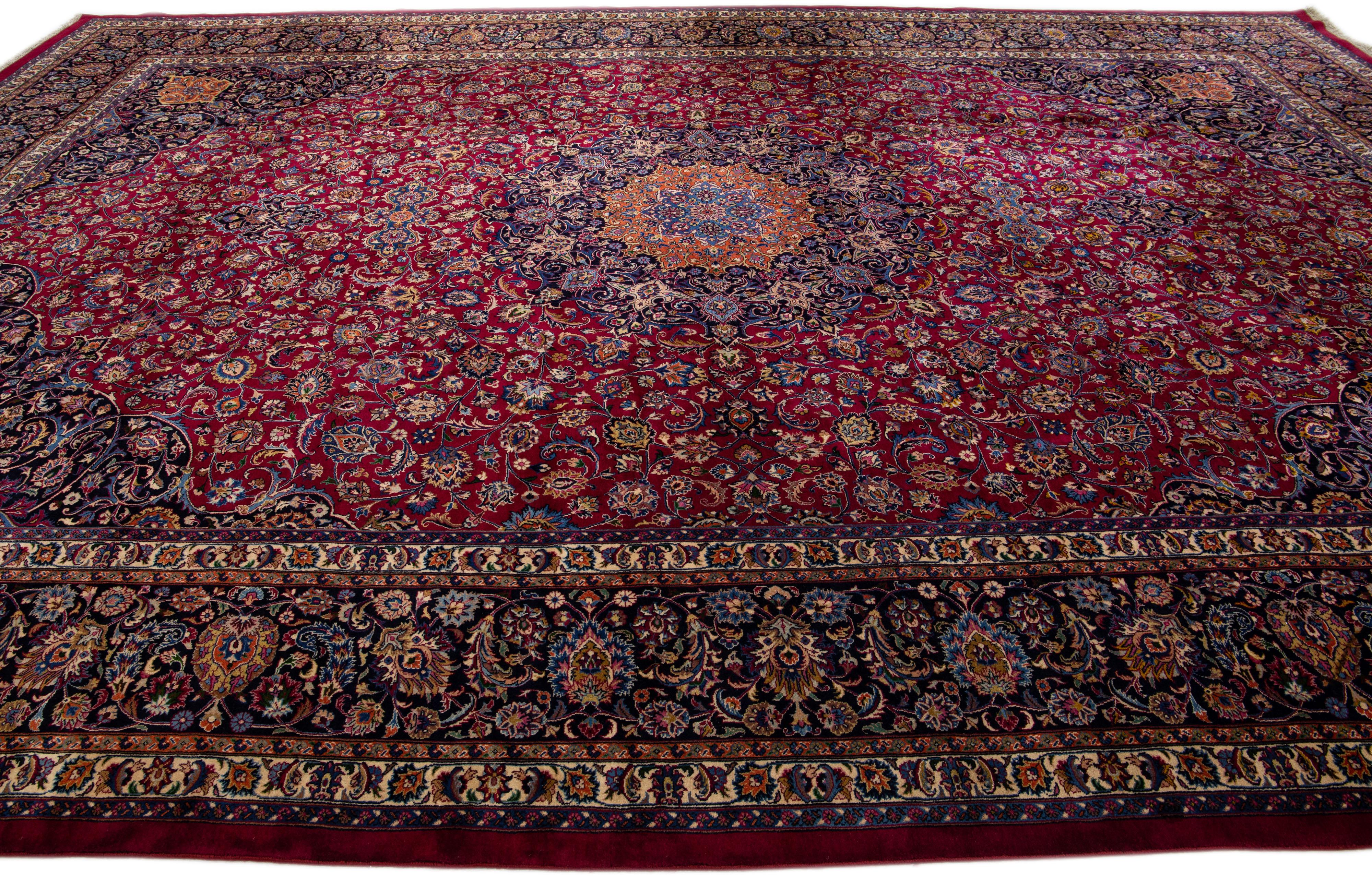 Antique Persian Mashad Handmade Red Oversize Wool Rug with Rosette Motif  In Good Condition For Sale In Norwalk, CT
