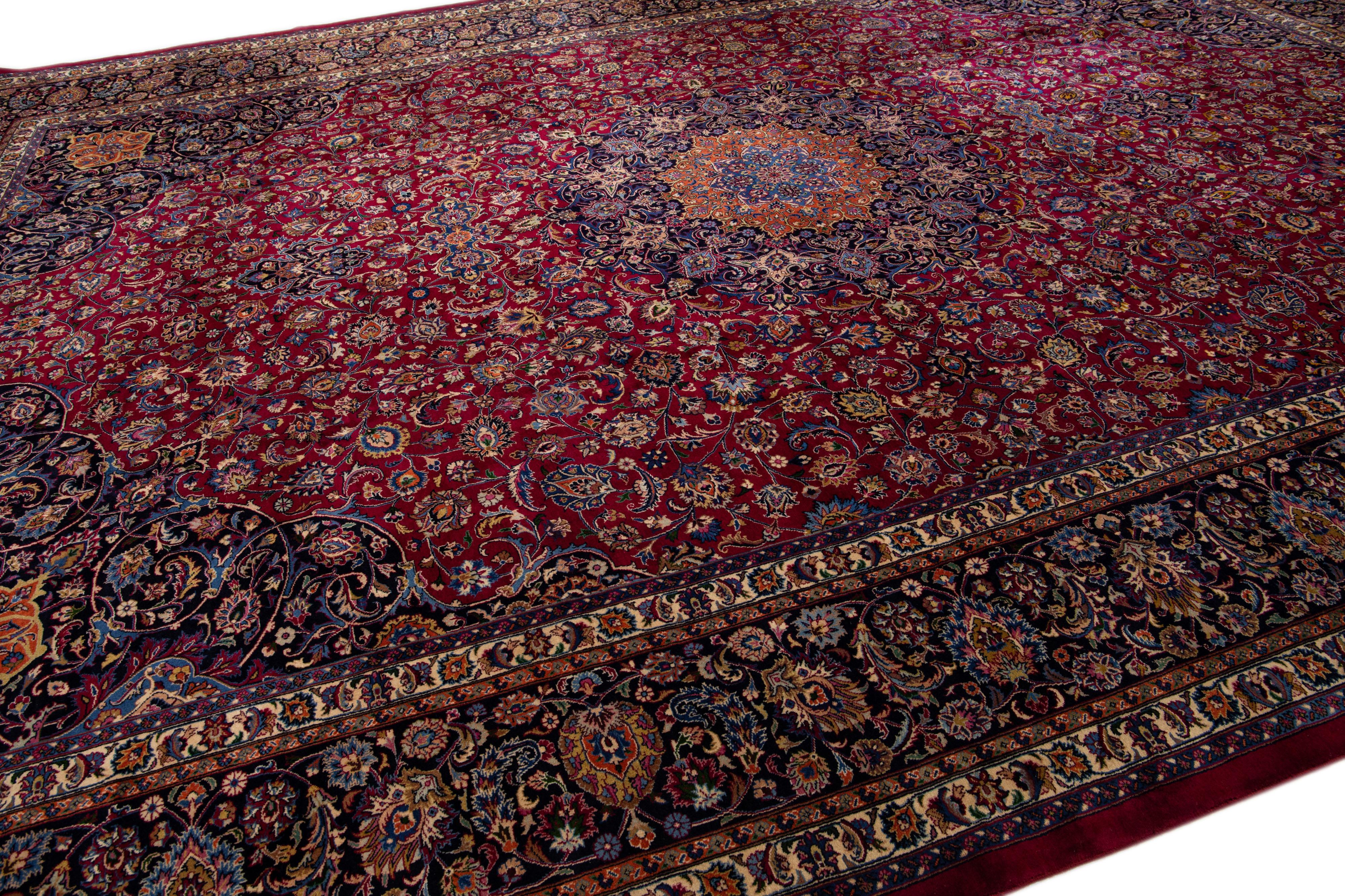 20th Century Antique Persian Mashad Handmade Red Oversize Wool Rug with Rosette Motif  For Sale