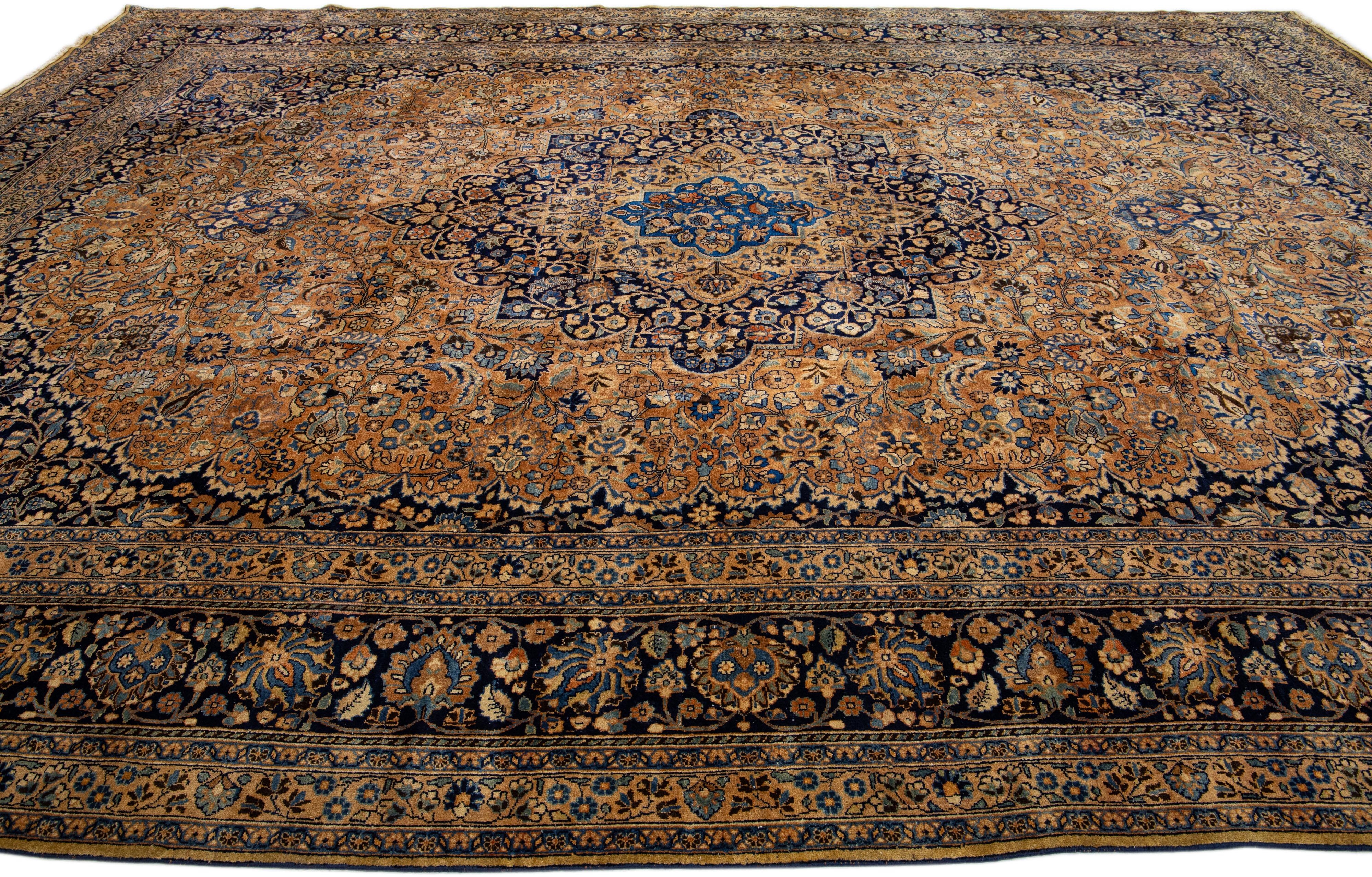20th Century Antique Persian Mashad Handmade Tan Wool Rug Rosette Motif For Sale