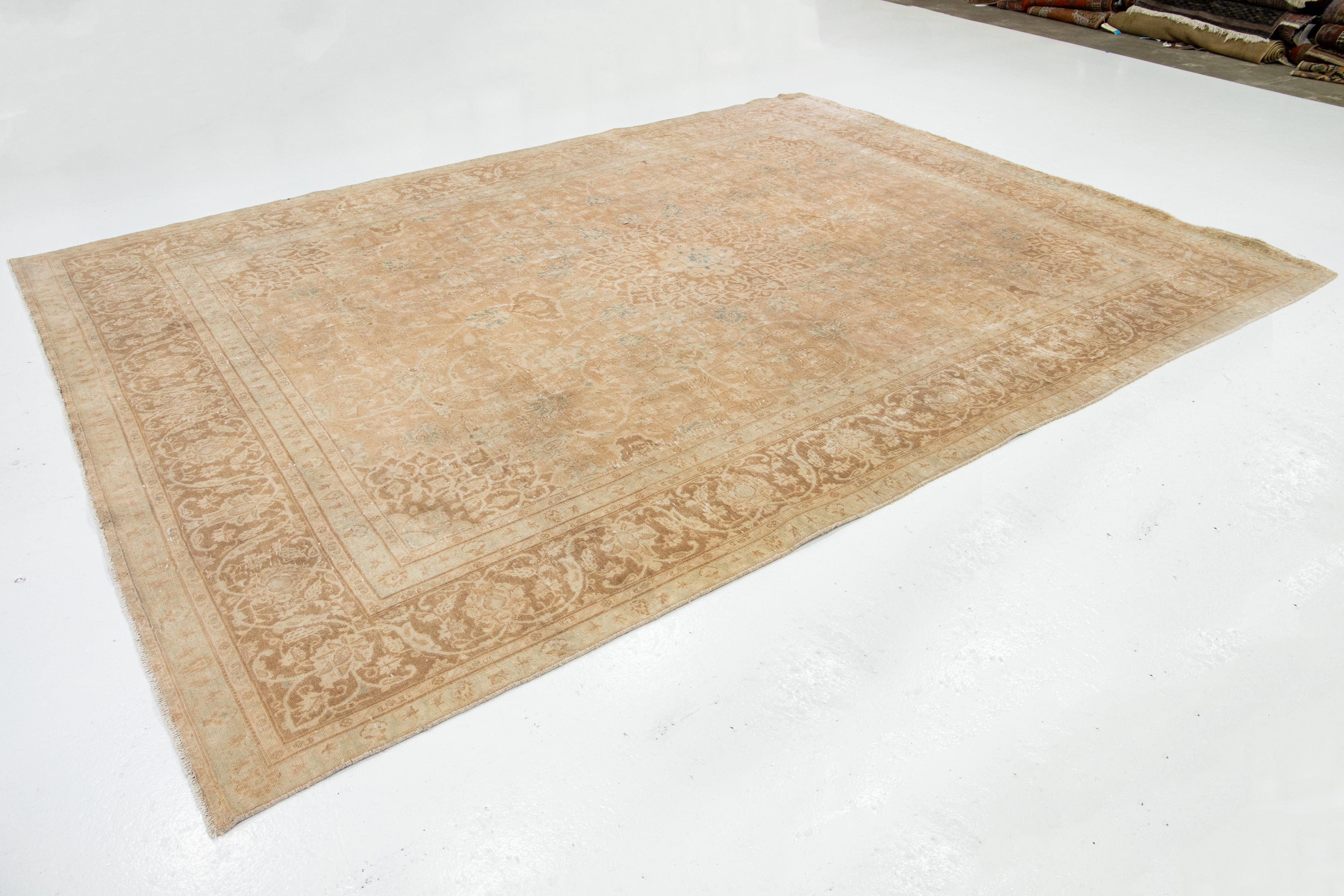 Antique Persian Mashad Handmade Wool Rug In Tan with Rosette Motif  In Good Condition For Sale In Norwalk, CT