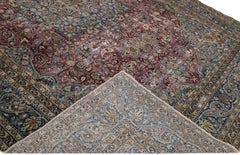 Antique Persian Mashad Red and Blue Handmade Wool Rug with Rosette Motif