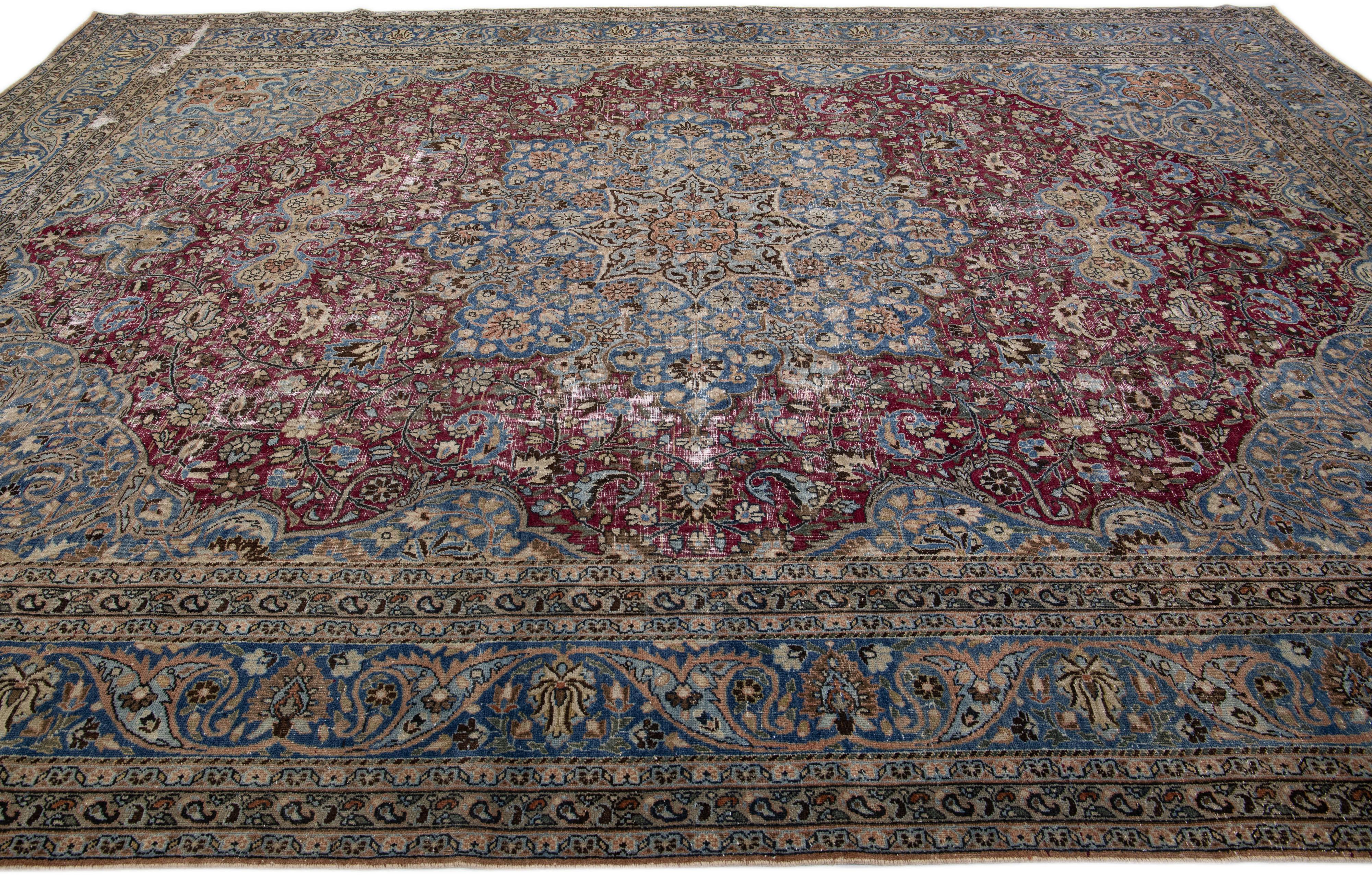 Antique Persian Mashad Red and Blue Handmade Wool Rug with Rosette Motif For Sale 1