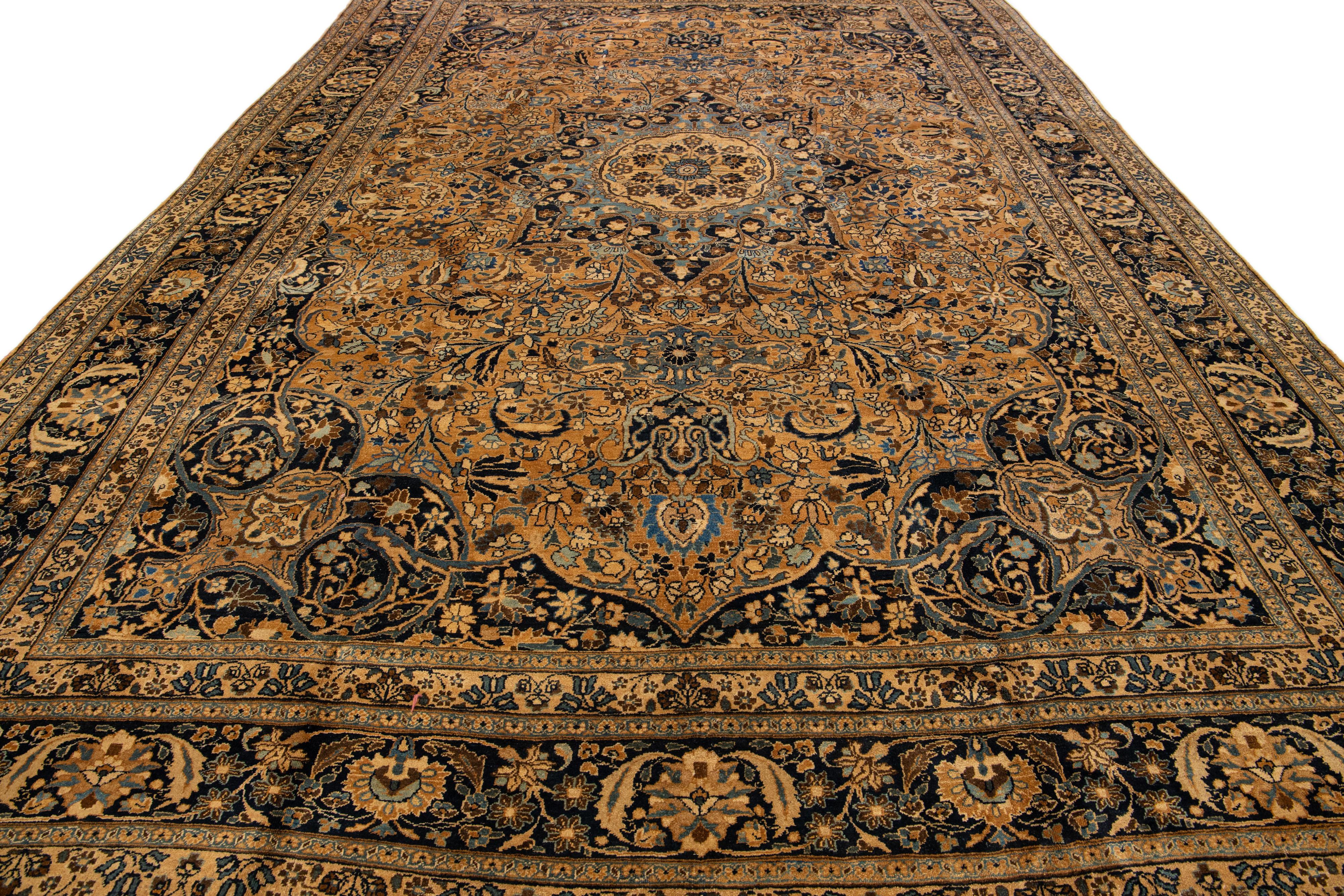 Islamic Antique Persian Mashad Tan Handmade Rosette Motif Wool Rug For Sale