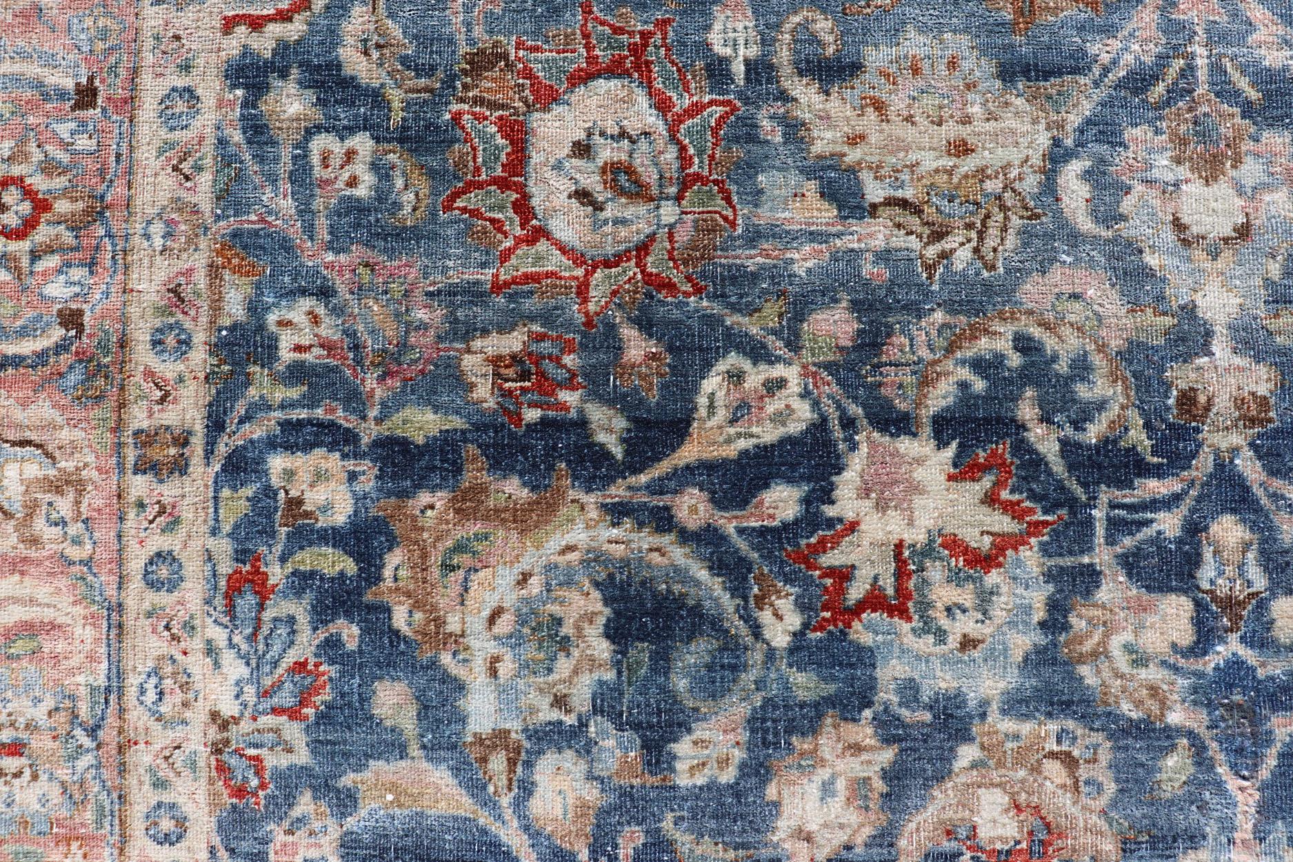 Wool Antique Persian Mashad with Medium in Boteh Blue Background, Salmon Border For Sale