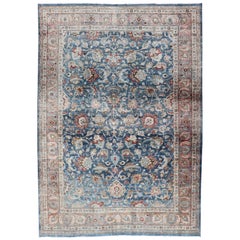 Ancien tapis persan Mashad avec fond bleu Boteh, bordure saumon, moyen