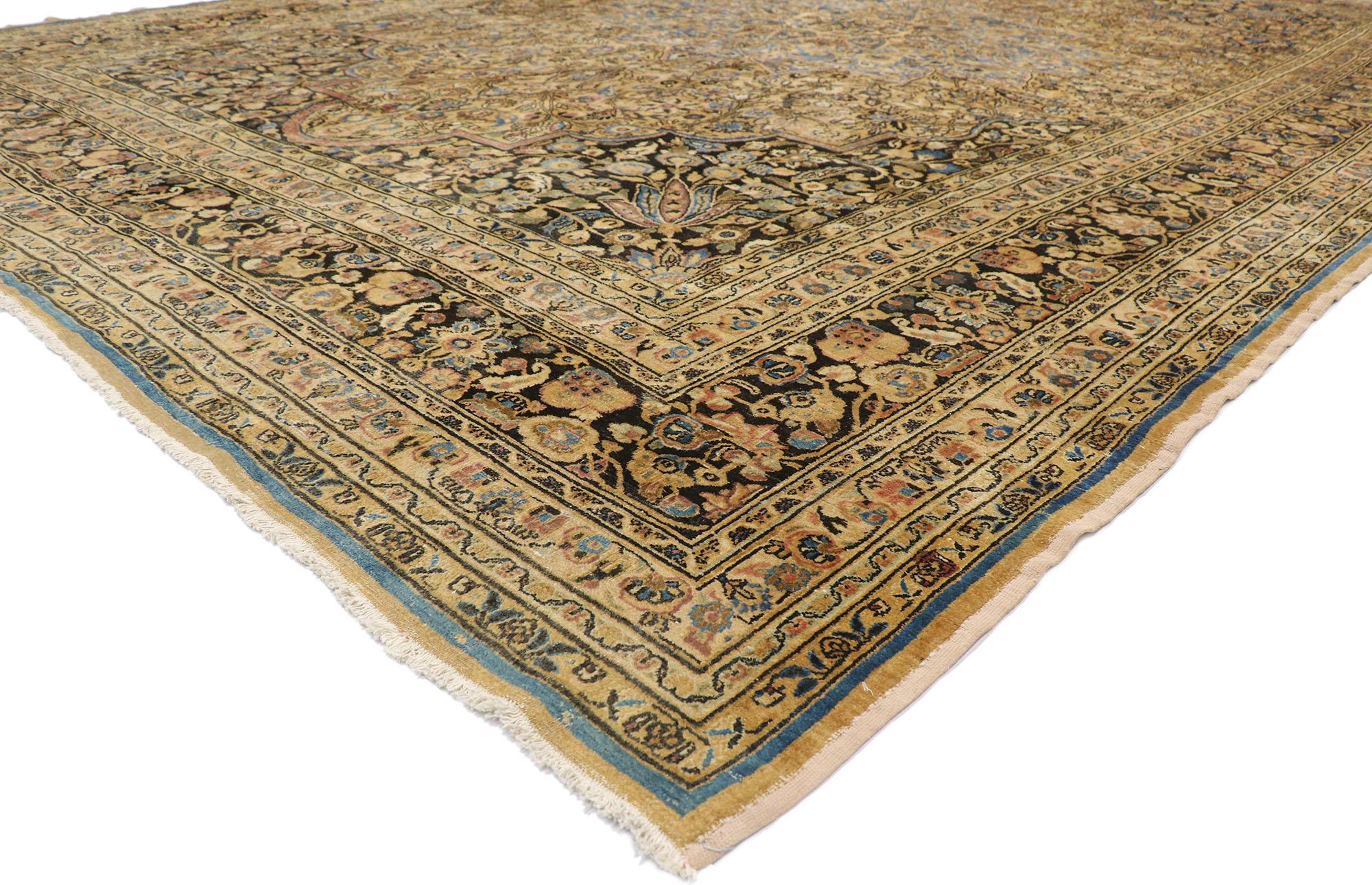 74000, grandeur antique Persian Mashhad Palace size rug with starburst medallion. This hand-knotted wool antique Persian Mashhad features a sixteen point Mashhad starburst medallion surrounded by an array of splayed palmettes, leafy tendrils,