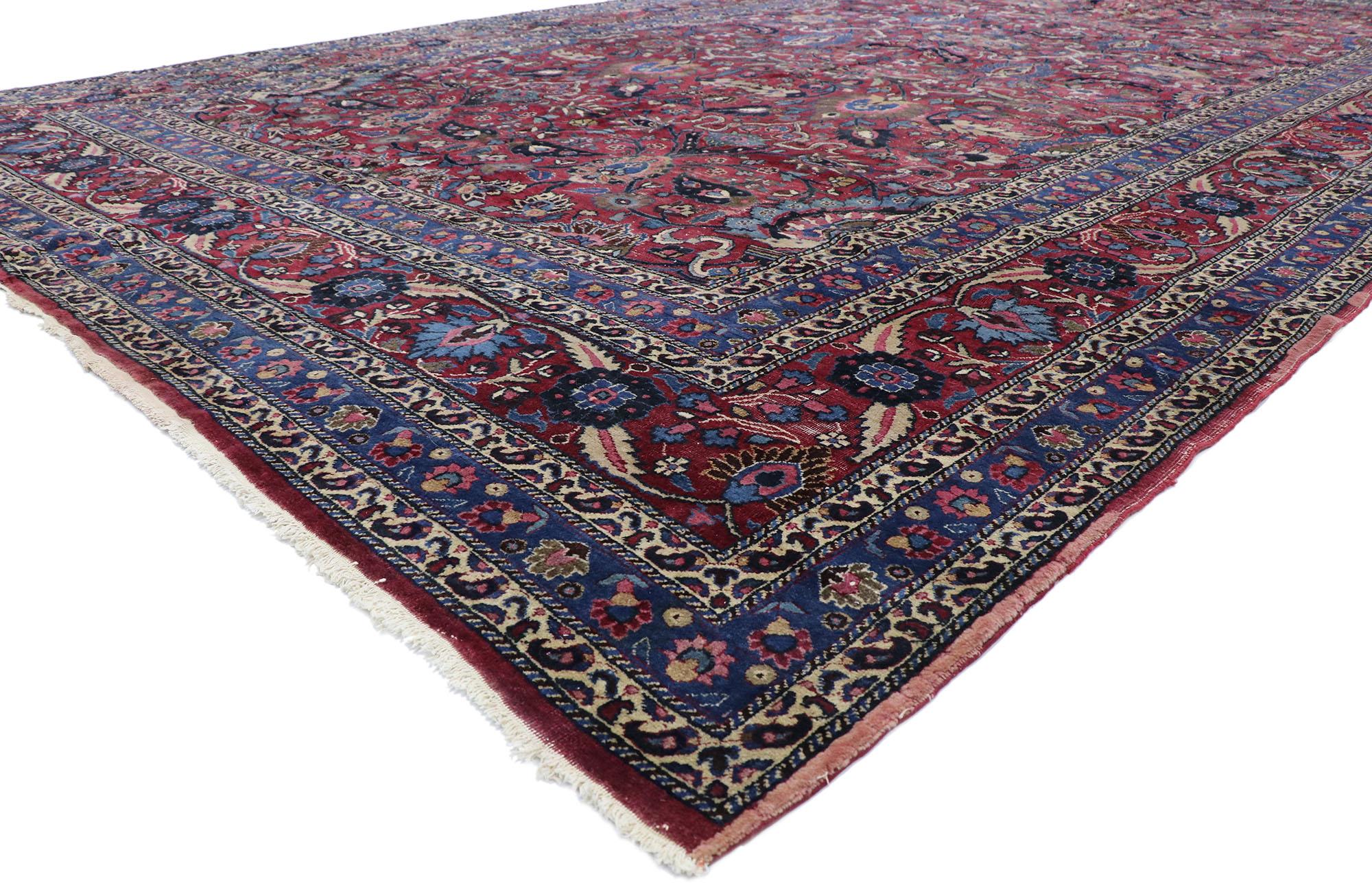 ?78067 Distressed Antique Persian Mashhad rug with Rustic Victorian Style 10'05 x 18'11. ??With its beguiling beauty, lovingly time-worn composition, and rich jewel-tones, this hand-knotted wool antique Persian Mashhad rug is poised to impress. The