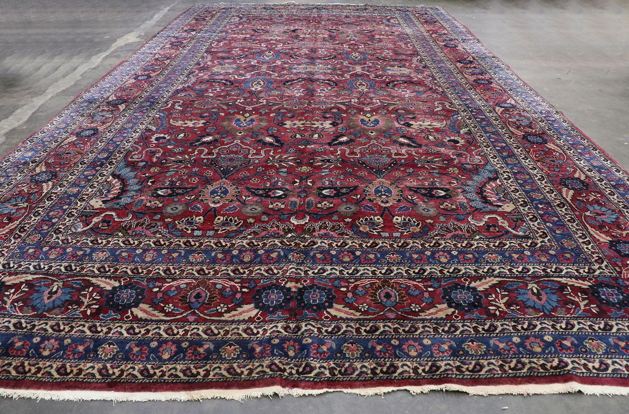 Wool Antique Persian Mashhad Rug with Rustic Victorian Style For Sale