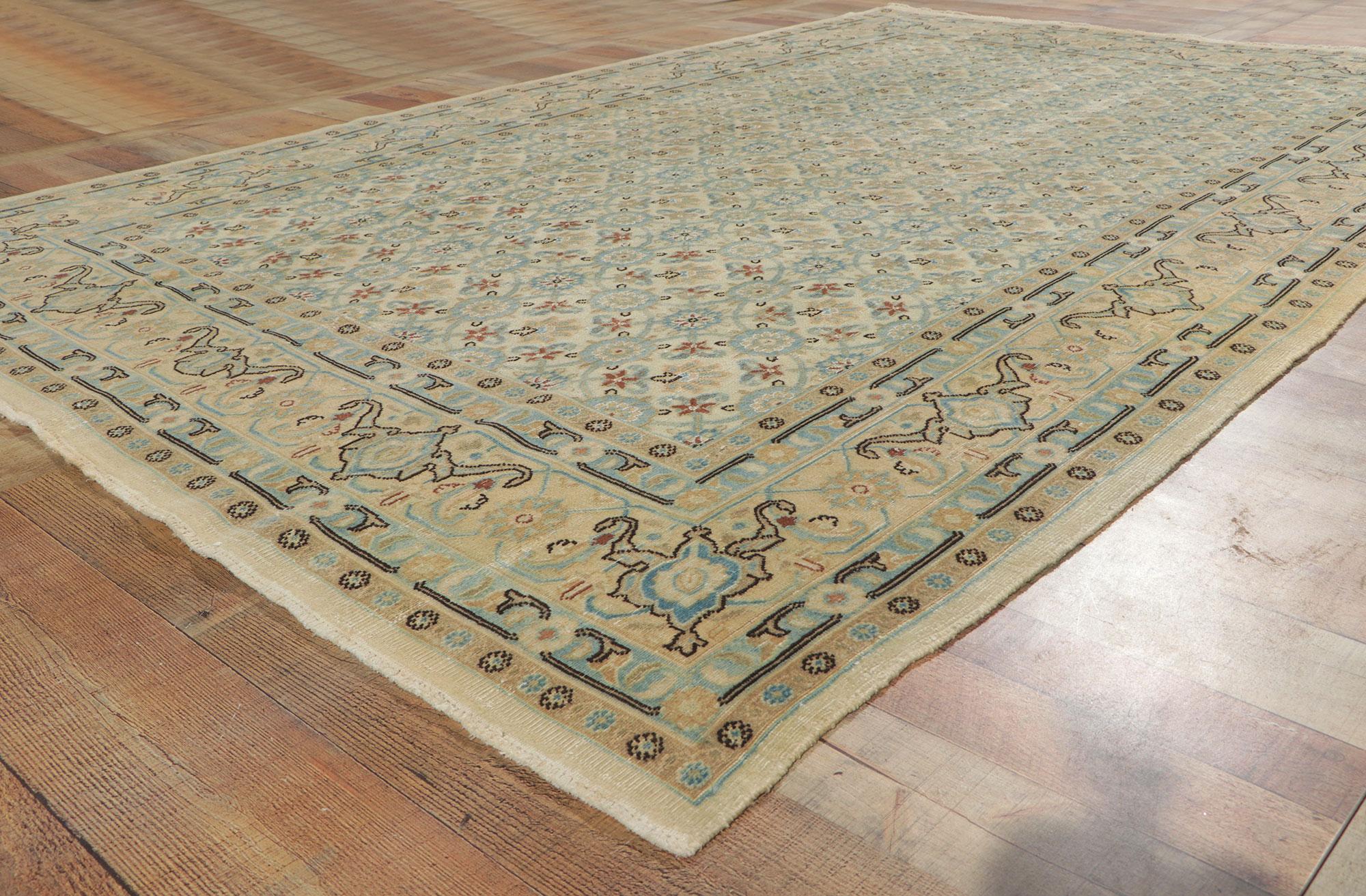 20th Century Antique Persian Mashhad Rug with Soft, Light Colors For Sale