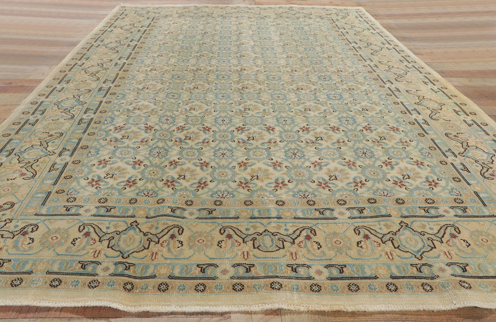 Wool Antique Persian Mashhad Rug with Soft, Light Colors For Sale