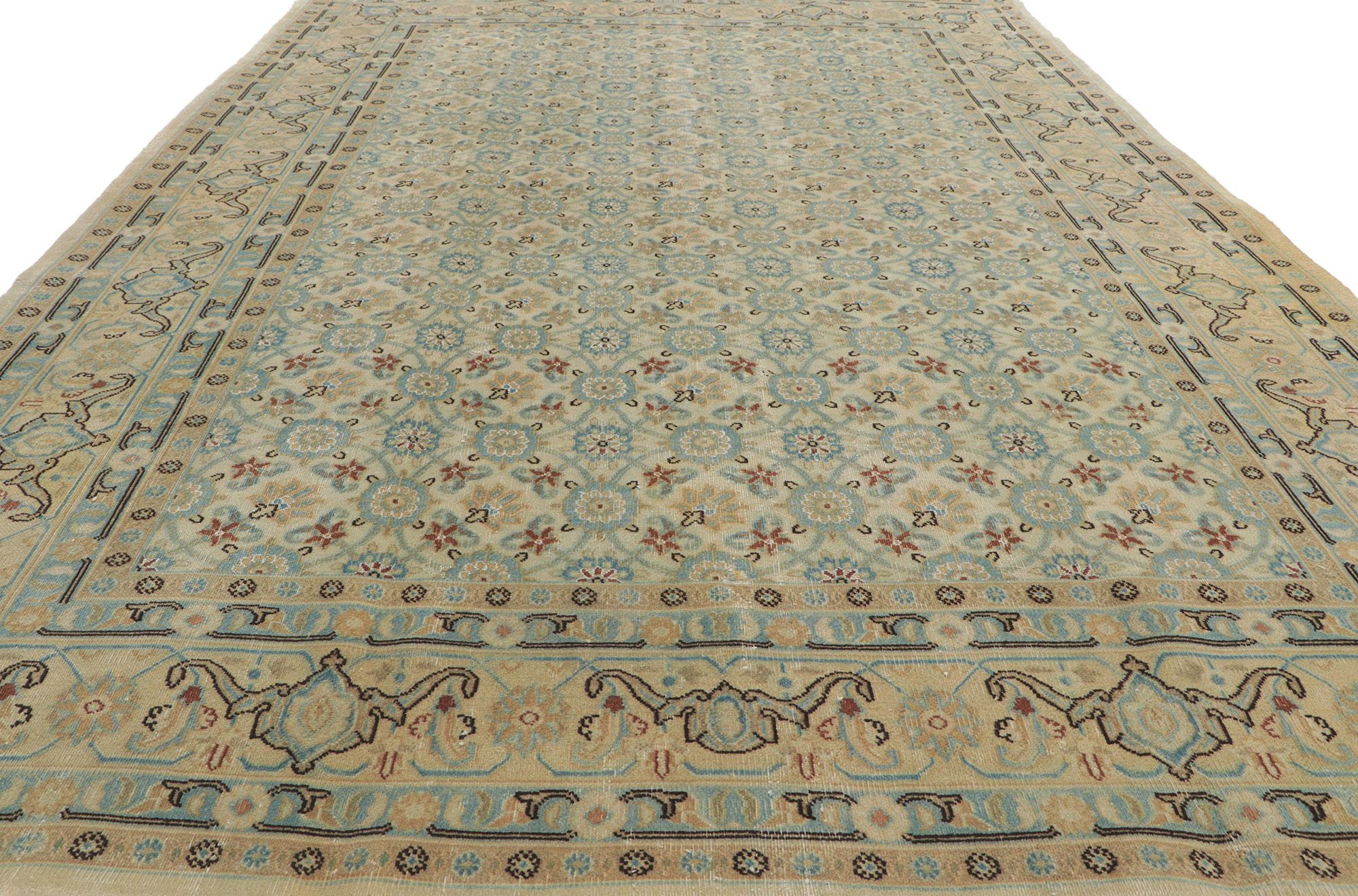 Hand-Knotted Antique Persian Mashhad Rug with Soft, Light Colors For Sale