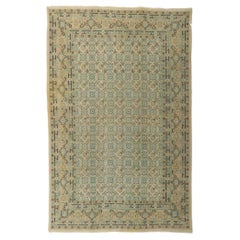 Vintage Persian Mashhad Rug with Soft, Light Colors