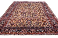 Antique Persian Mashhad Rug with Traditional Style
