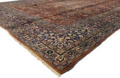 Antique Persian Mashhad Rug with Traditional Style