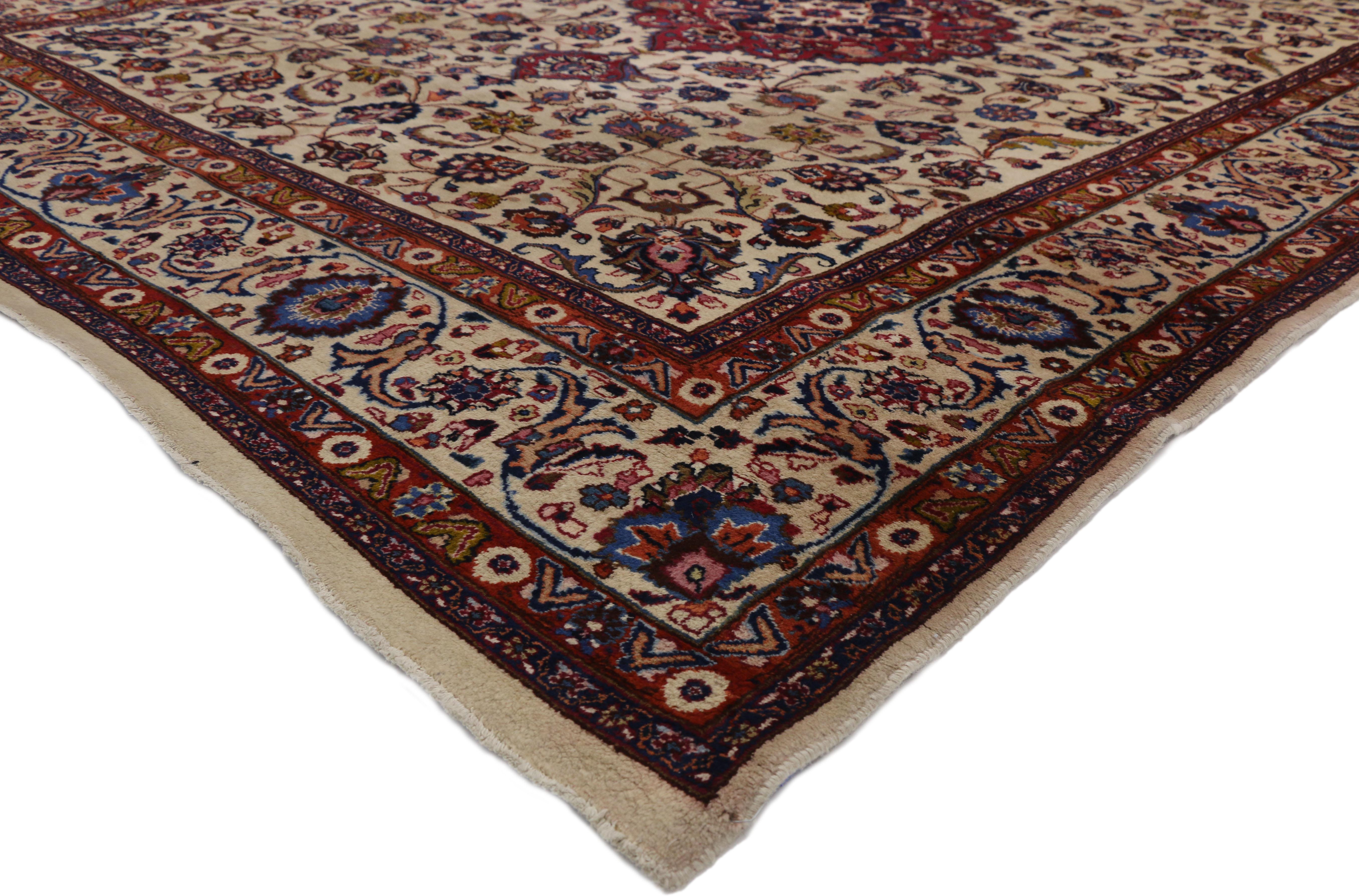 74418, antique Persian Mashhad rug with traditional style. With a timeless design and classic style, this antique Persian Mashhad rug keeps the eyes entertained, but it is still refined and elegant. The meticulous details radiate throughout the