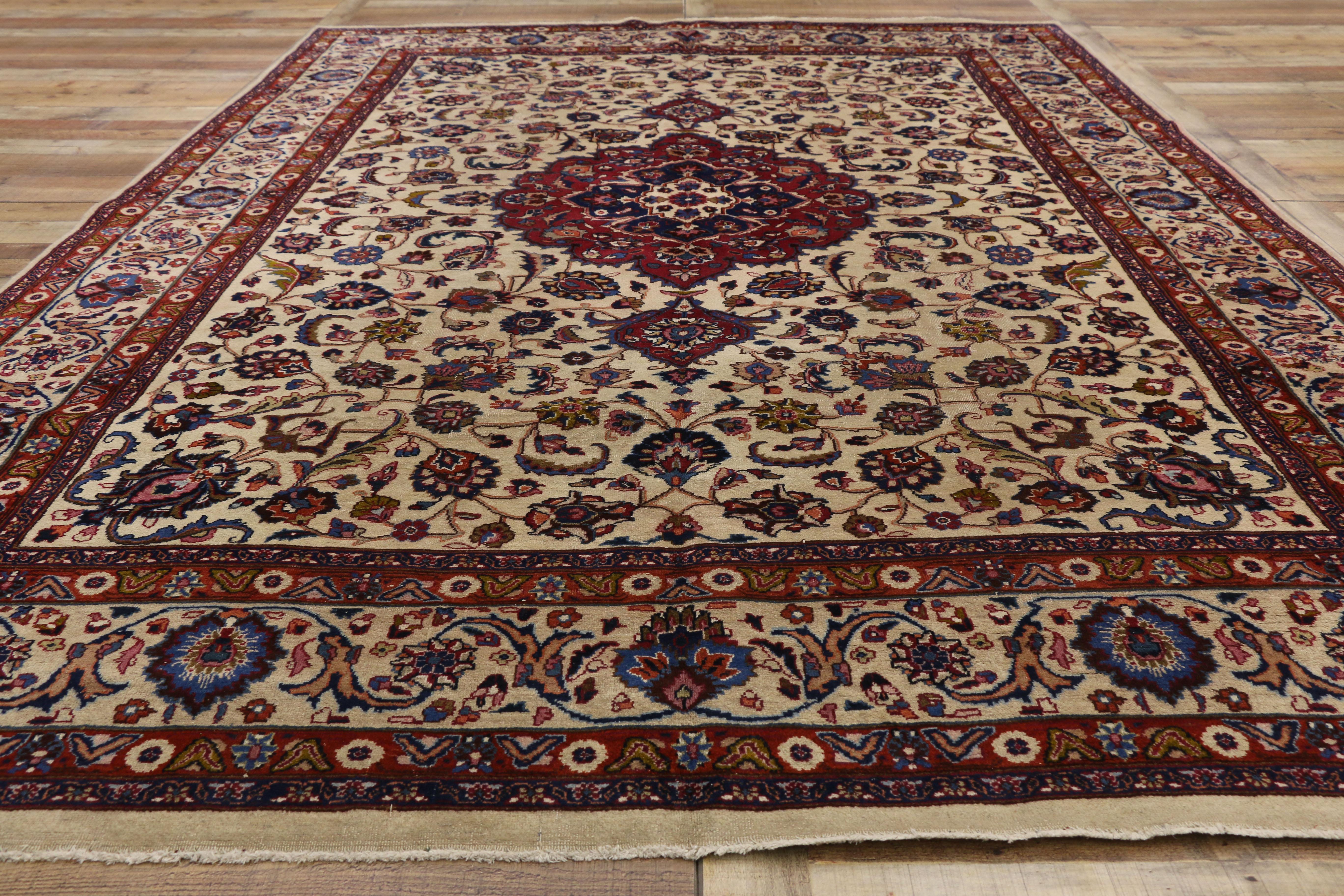 Wool Antique Persian Mashhad Rug with Traditional Style For Sale