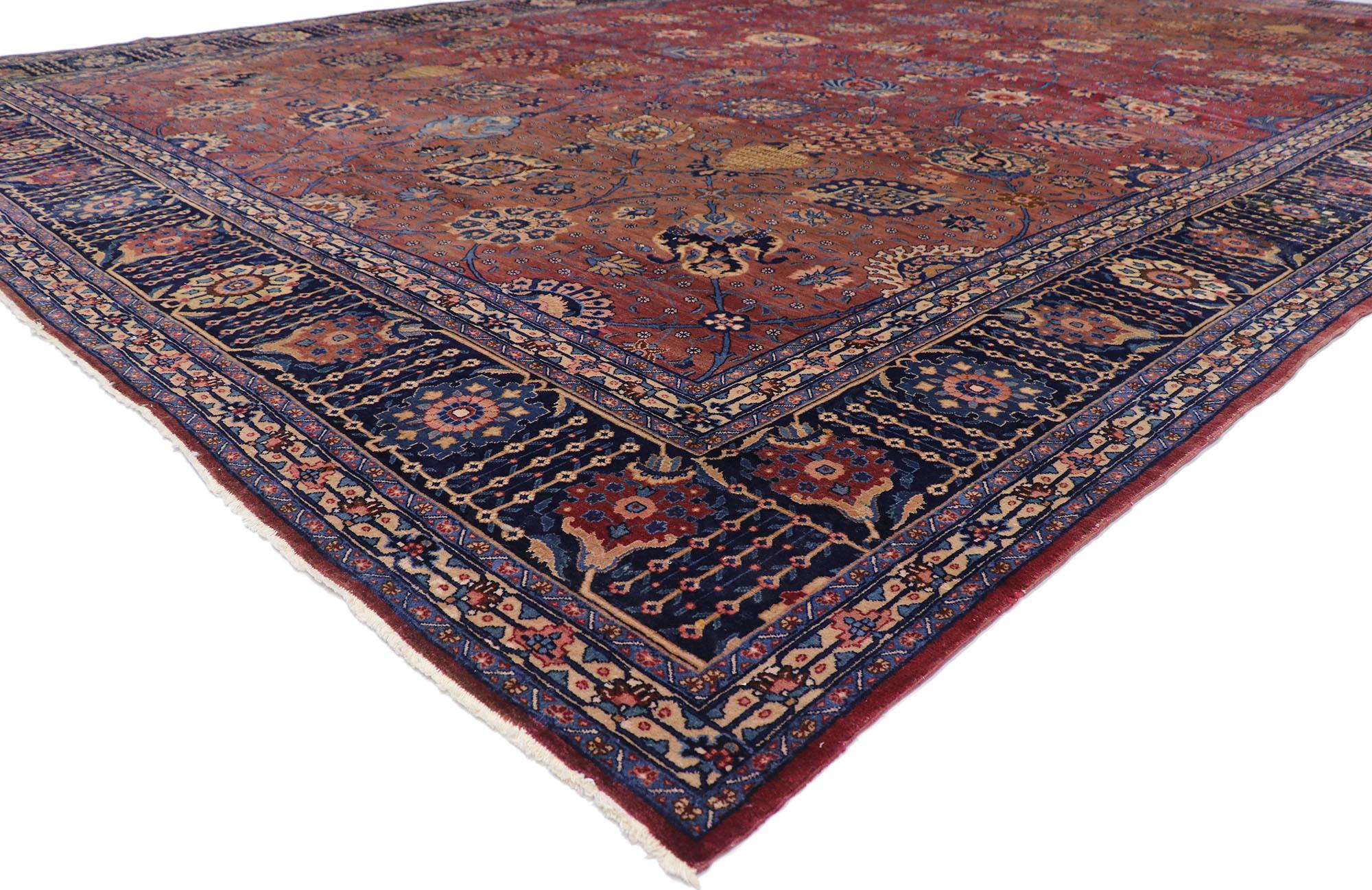 74931 Antique Indian Agra Rug 13'03 x 21'02. With its beguiling beauty and rich jewel-tones, this hand-knotted wool antique Indian Agra rug is poised to impress. The abrashed burgundy hued field features an all-over botanical pattern composed of