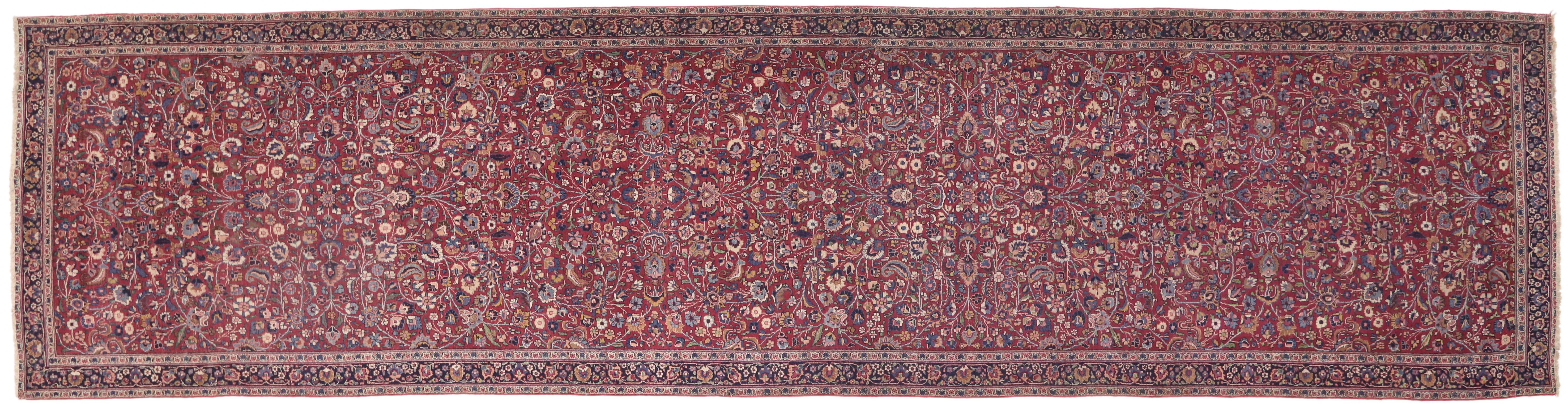 74286 Antique Persian Mashhad Runner with Old World Style, Extra Long Hallway Runner 05'07 x 22'00. Rich in color, texture and beguiling ambiance, this hand knotted wool antique Persian Mashhad rug runner beautifully displays timeless elegance and