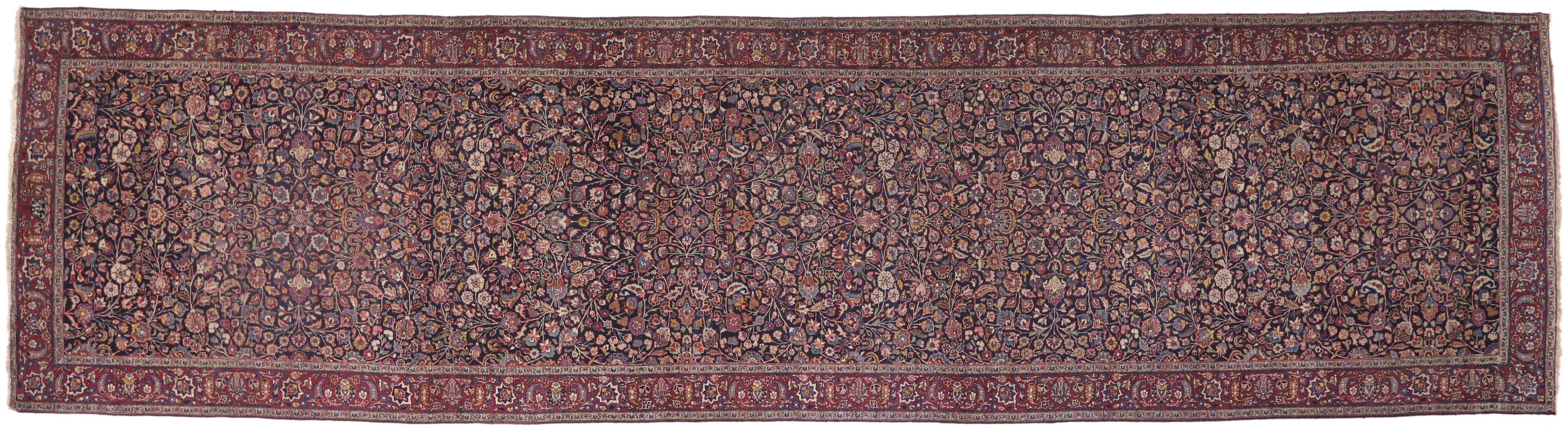 74288 ​Antique Persian Mashhad Runner with Old World Style, Extra Long Hallway Runner​ 05'07 x 21'04. Rich in color, texture and beguiling ambiance, this hand knotted wool antique Persian Mashhad rug runner beautifully displays timeless elegance and