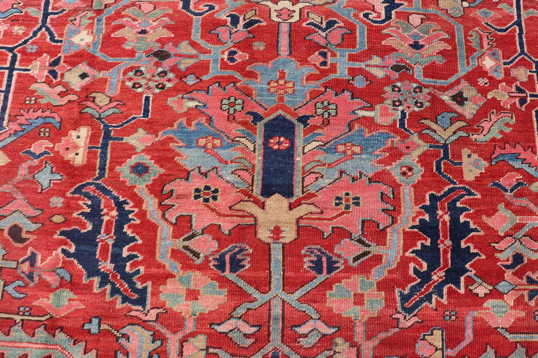 Antique Persian Medallion Serapi Rug With Red Background and Blue Border In Excellent Condition For Sale In Atlanta, GA