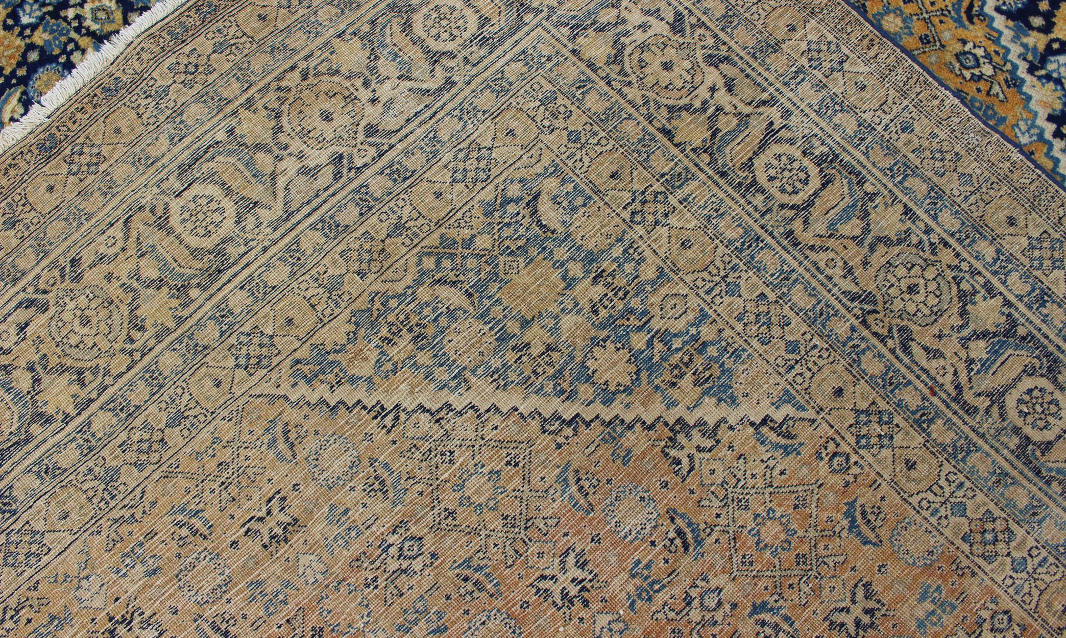 Hand-Knotted Antique Persian Tabriz Rug with Medallion And A Variety of Blue's and Gold's For Sale