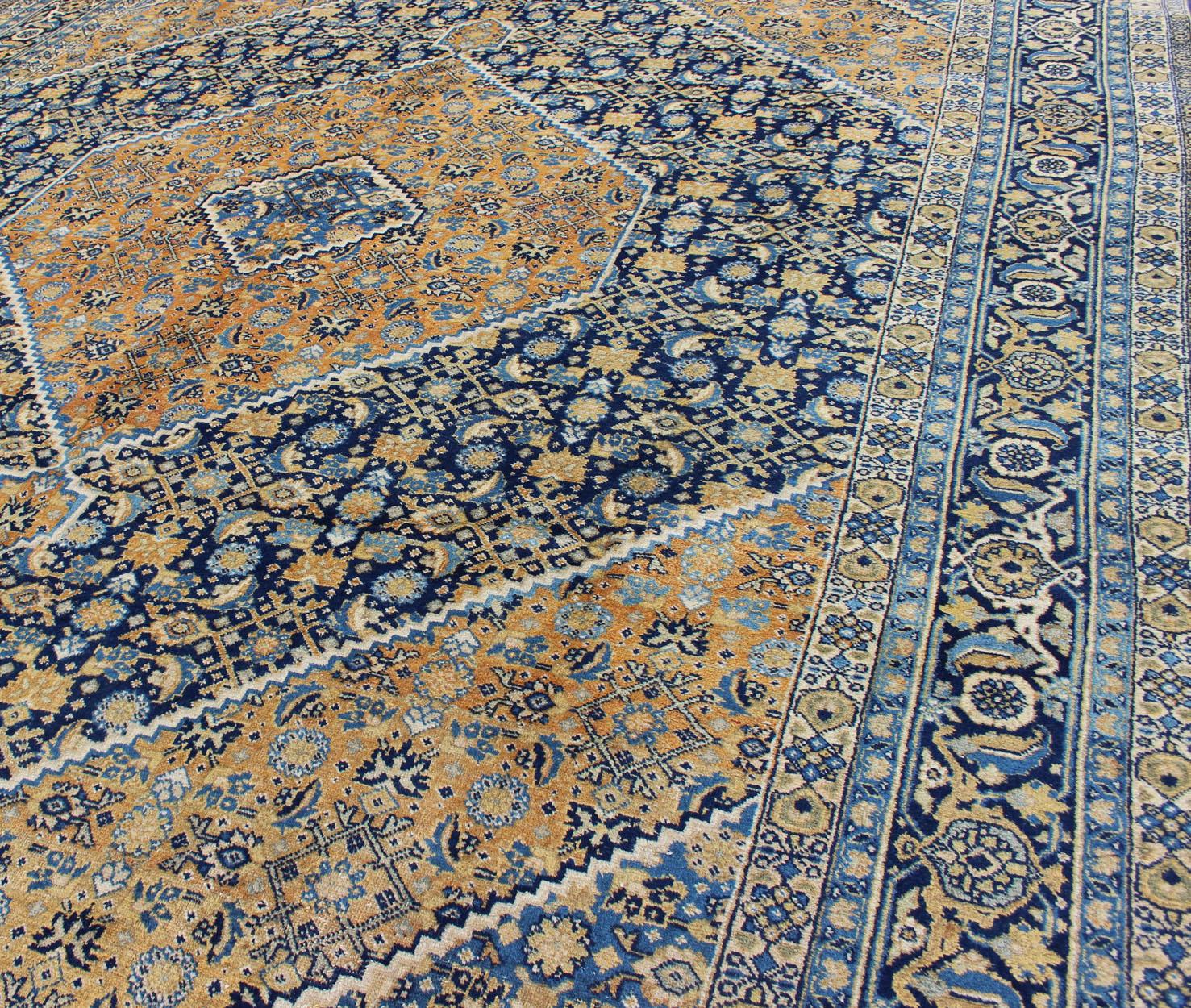 Antique Persian Tabriz Rug with Medallion And A Variety of Blue's and Gold's For Sale 1