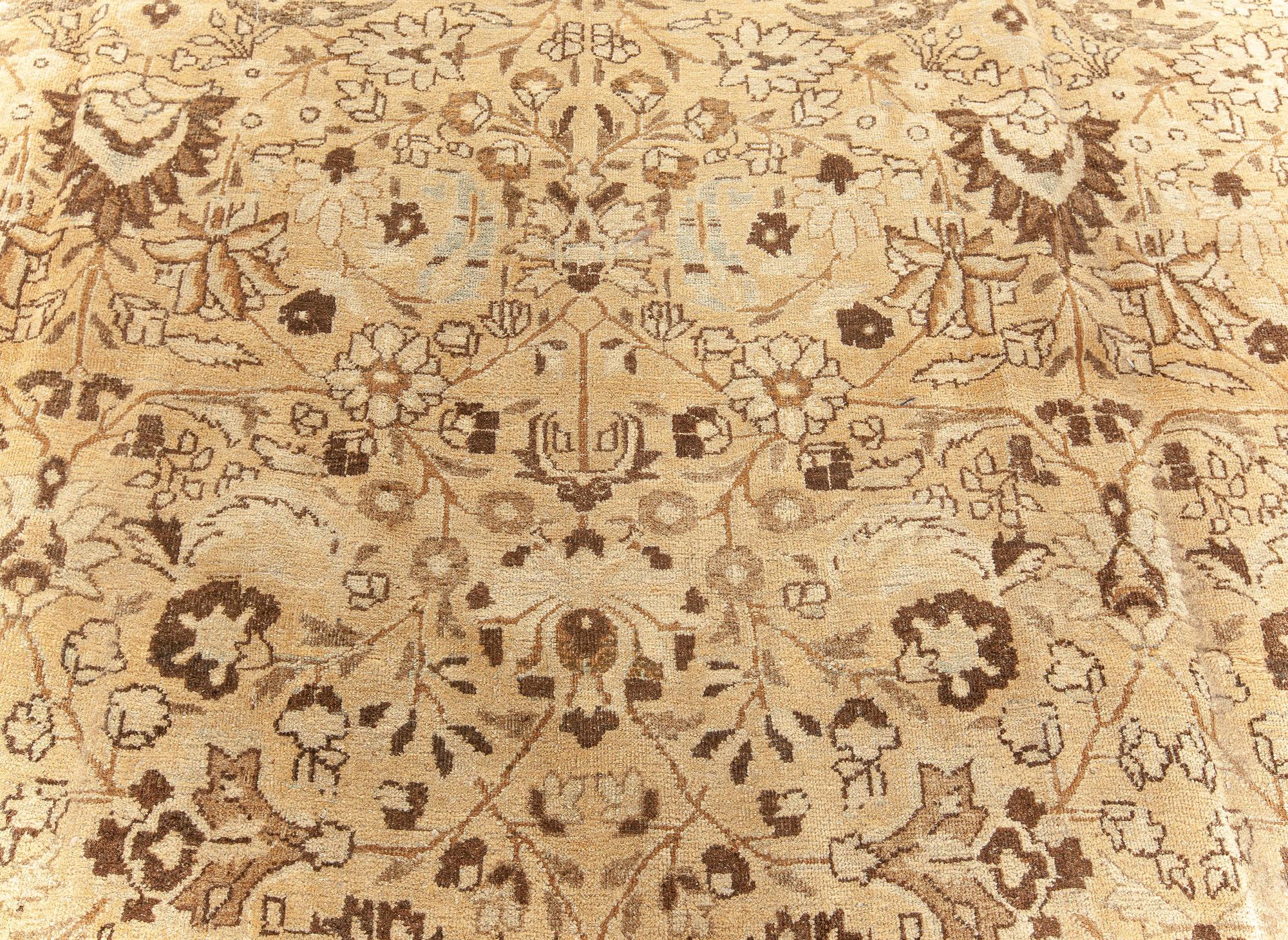 Antique Persian Meshad handmade wool rug
Size: 9'6