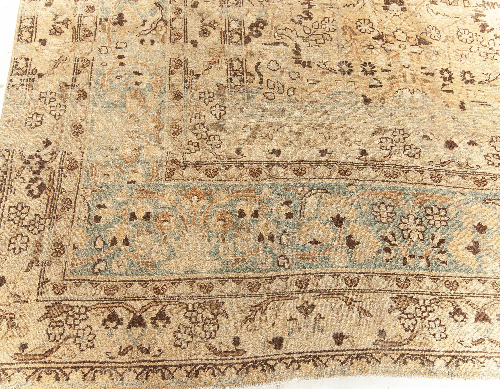 20th Century Antique Persian Meshad Handmade Wool Rug For Sale