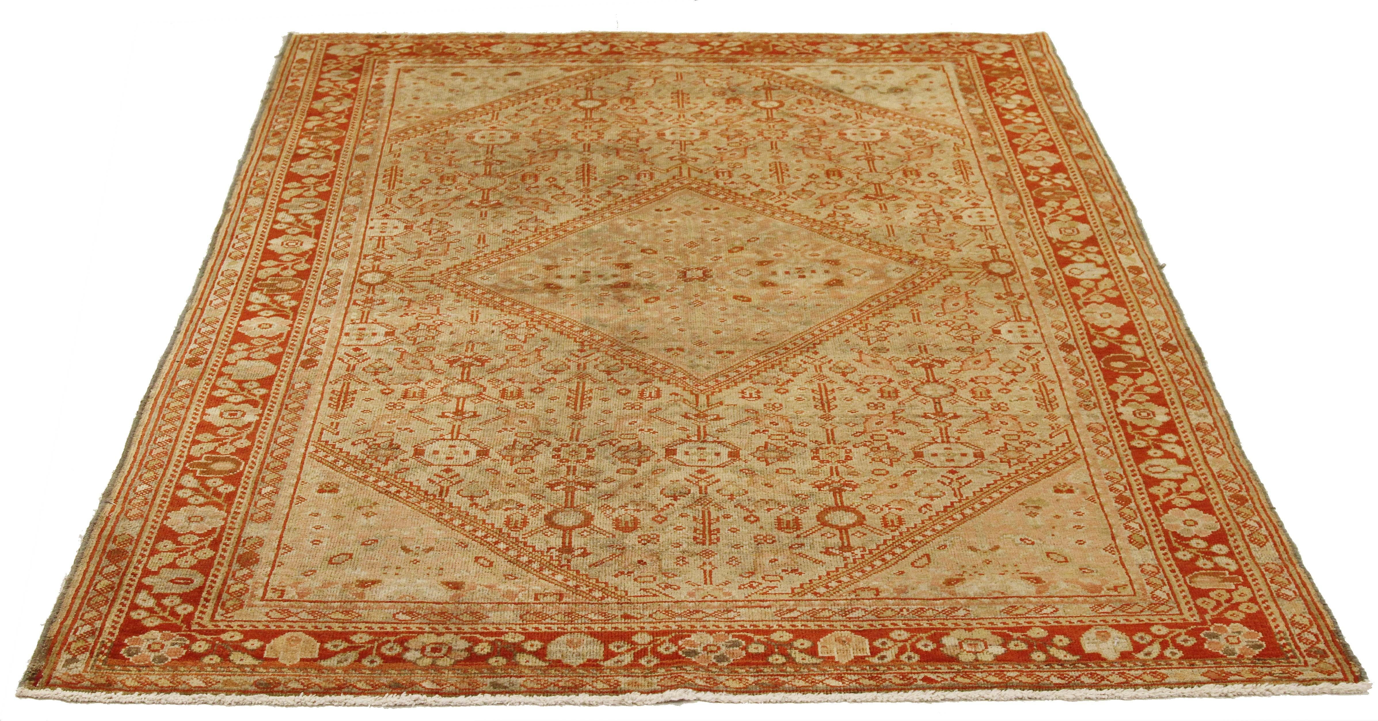 Antique Persian runner rug handwoven from the finest sheep’s wool and colored with all-natural vegetable dyes that are safe for humans and pets. It’s a traditional Meshkabad design featuring a big diamond floral medallion in red and beige over an