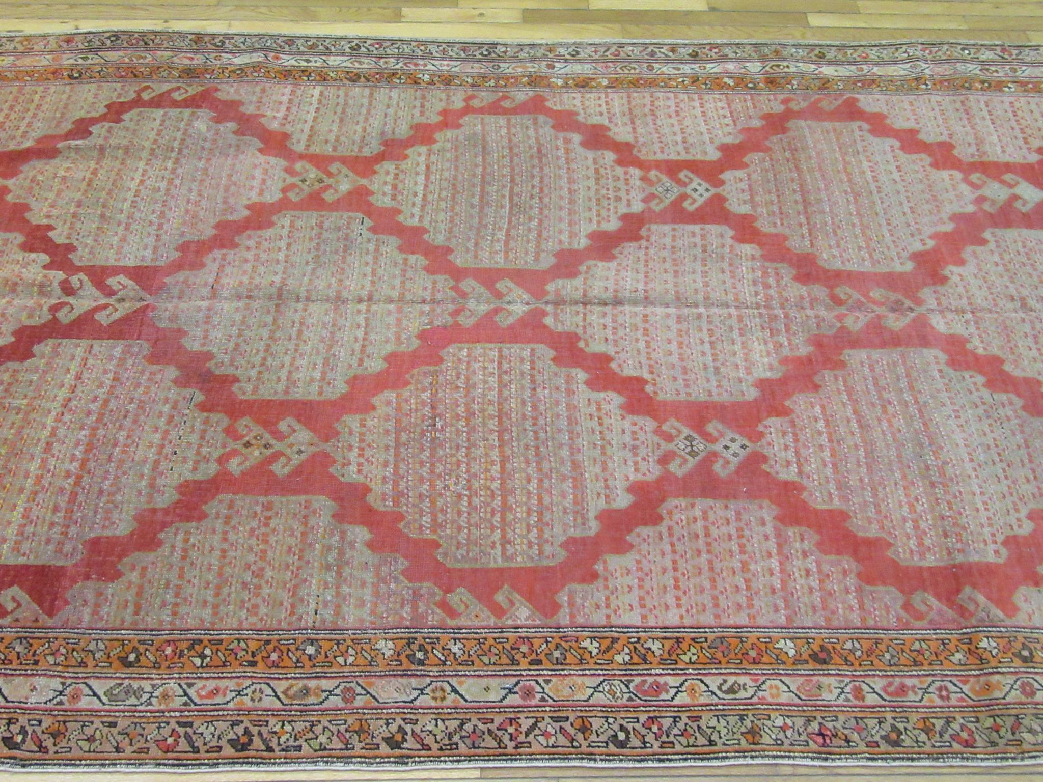 20th Century Antique Hand Knotted Wool Red Persian Meshkin Gallery Rug For Sale