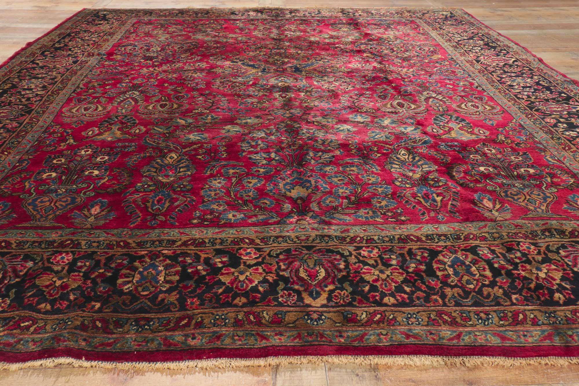 ?77787 antique Persian Mohajeran Sarouk rug 09'03 x 11'05. With its beguiling beauty and rich jewel-tones, this hand knotted wool antique Persian Sarouk rug is poised to impress. The abrashed burgundy field features an all-over botanical pattern