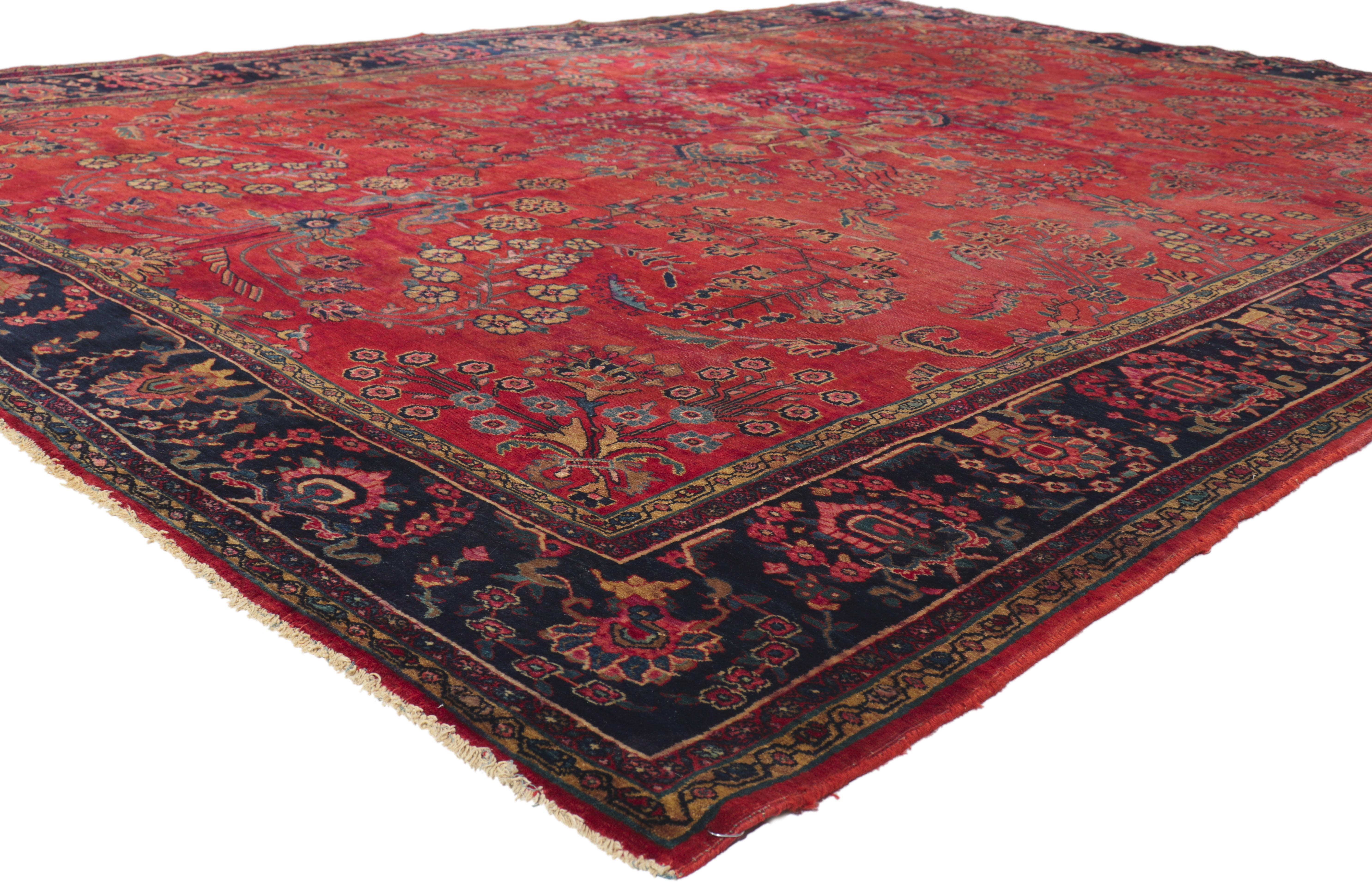 78460 Antique Red Persian Sarouk Rug, 08'08 x 12'03.
Rich in color with beguiling decadence, this hand knotted wool antique Persian Sarouk rug is a captivating vision of woven beauty. The elaborate floral design and sophisticated color palette woven