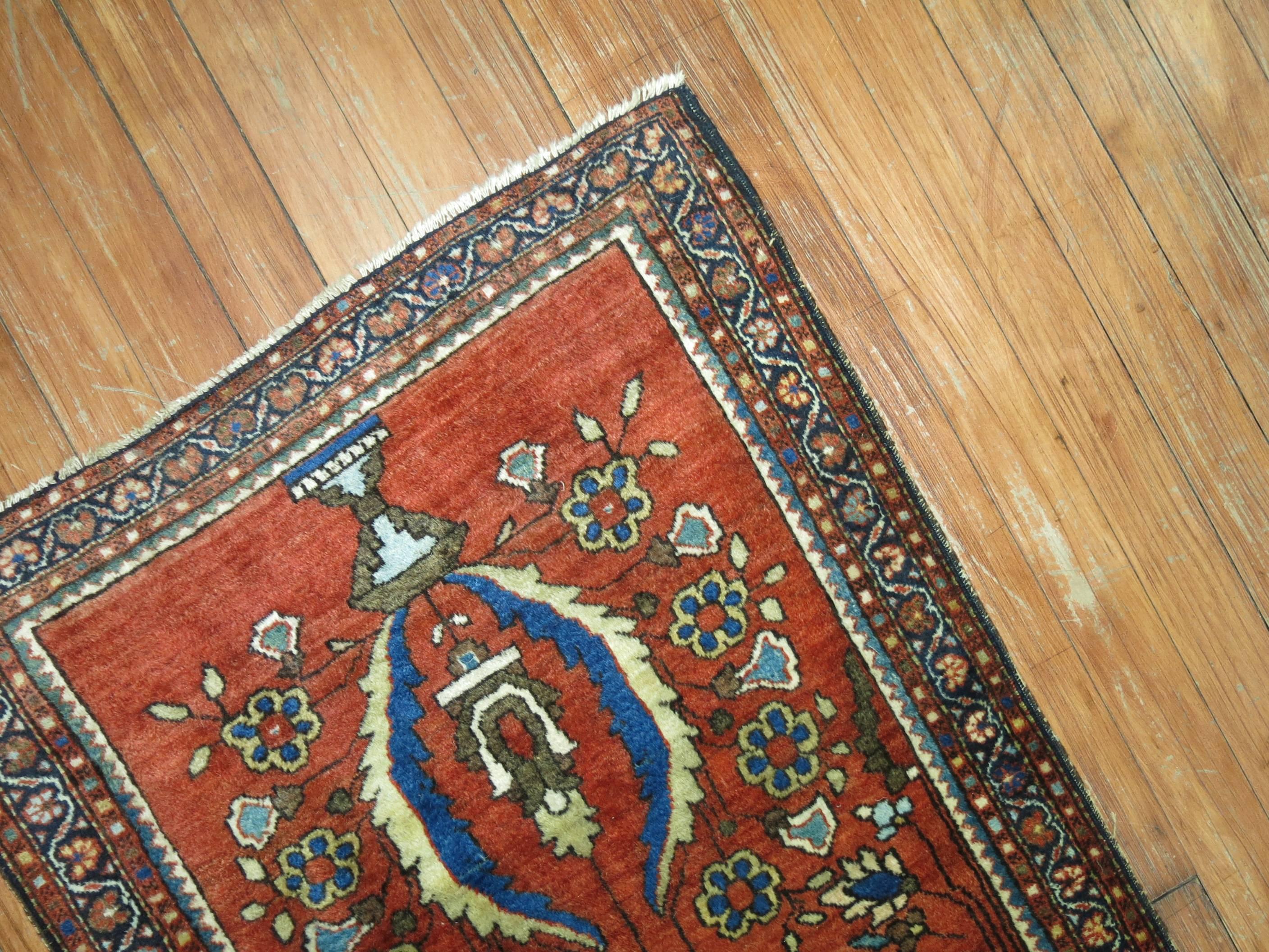 A late 19th century rare size Persian sarouk mohajeran small runner.

Measures: 2' x 4'6''.