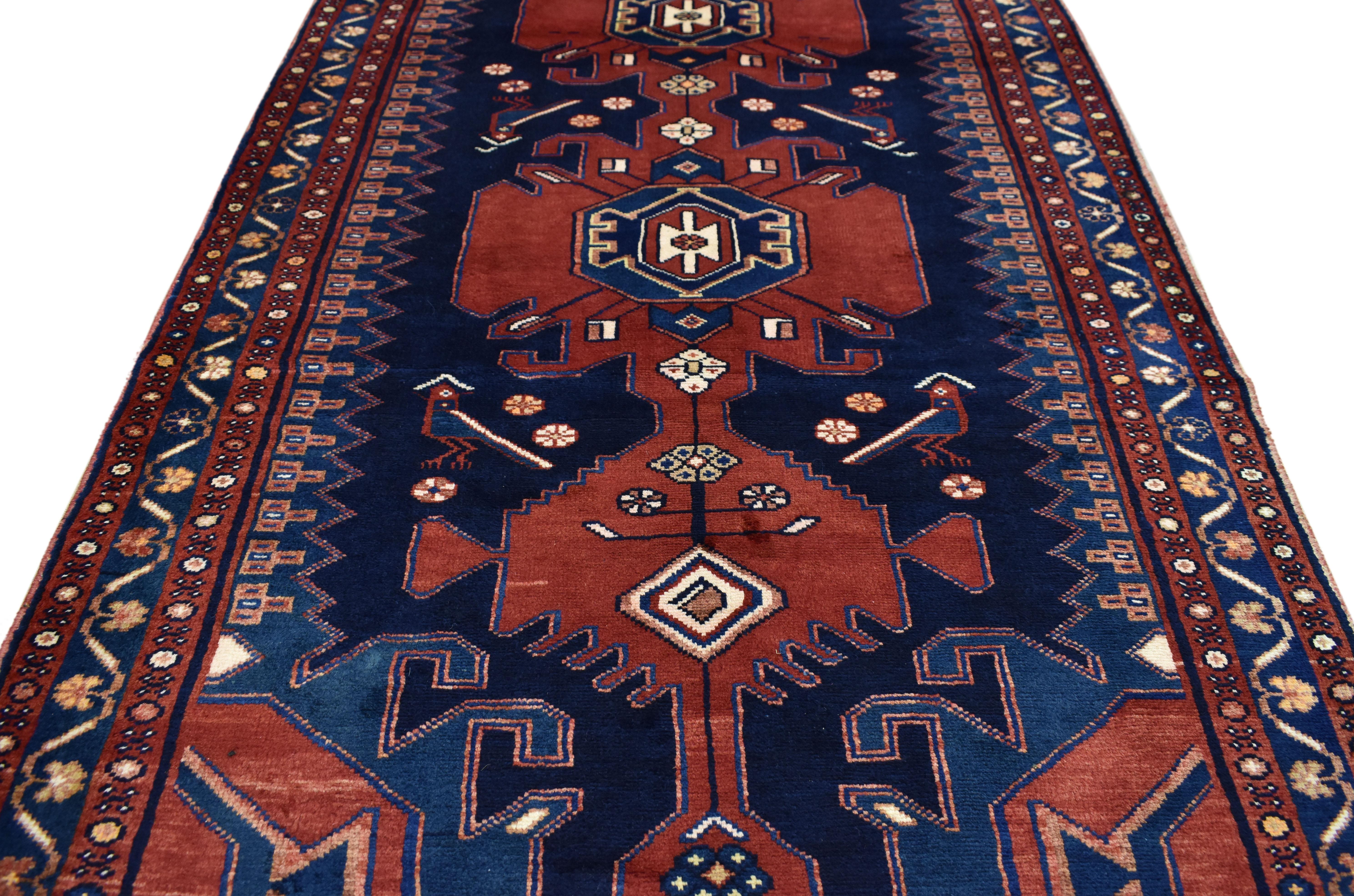 75360 Antique Persian Nahavand Hamadan Runner with Modern Tribal Style. This hand-knotted wool antique Persian Nahavand Hamadan runner with modern tribal style showcases an extravagant geometric pole medallion design rendered in saturated colors of